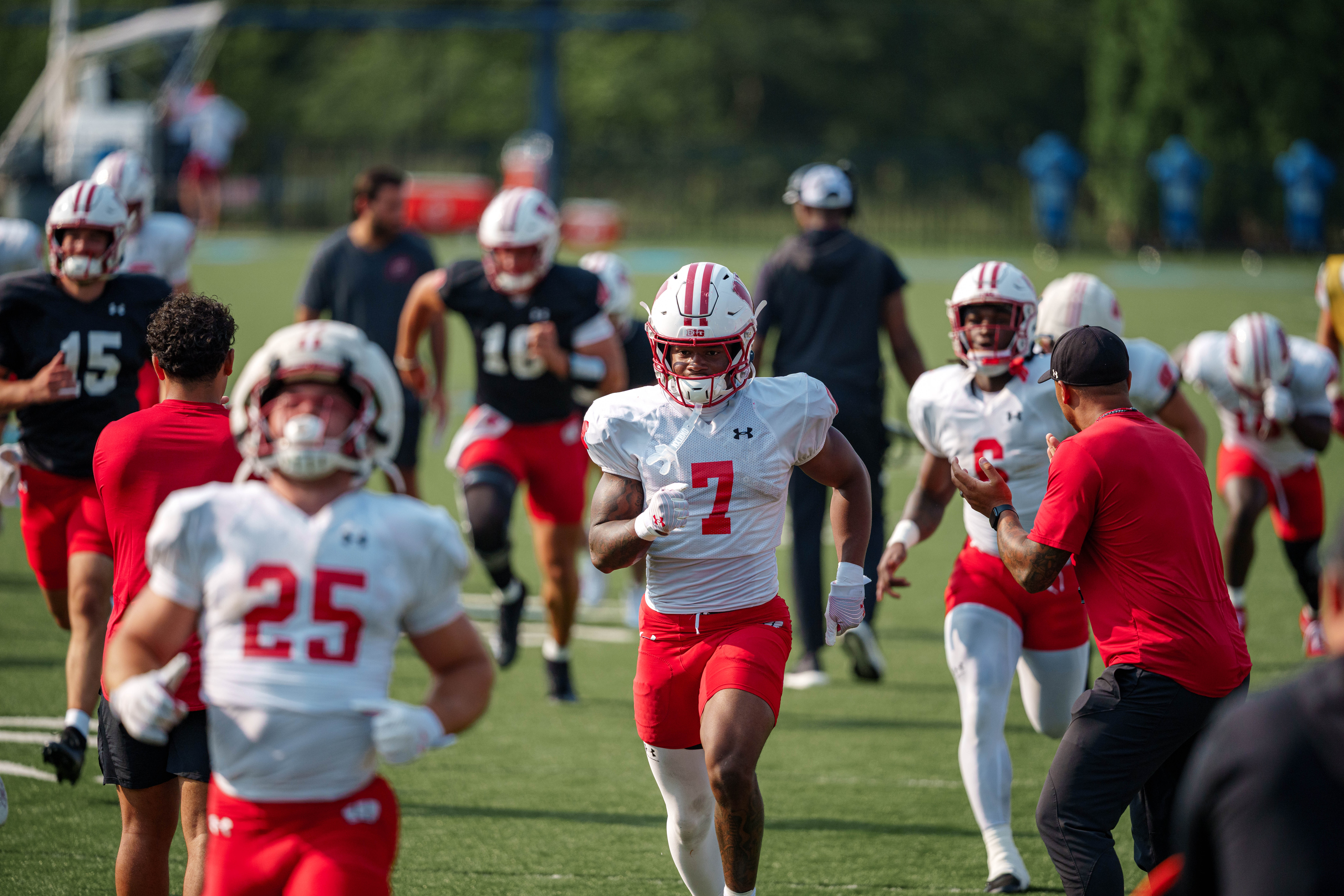 Wisconsin Badgers running back Dilin Jones (7) does sprints during training camp at Ralph E. Davis Pioneer Stadium on August 03, 2025 in Platteville, Wisconsin. Photography by Ross Harried for Second Crop Sports.