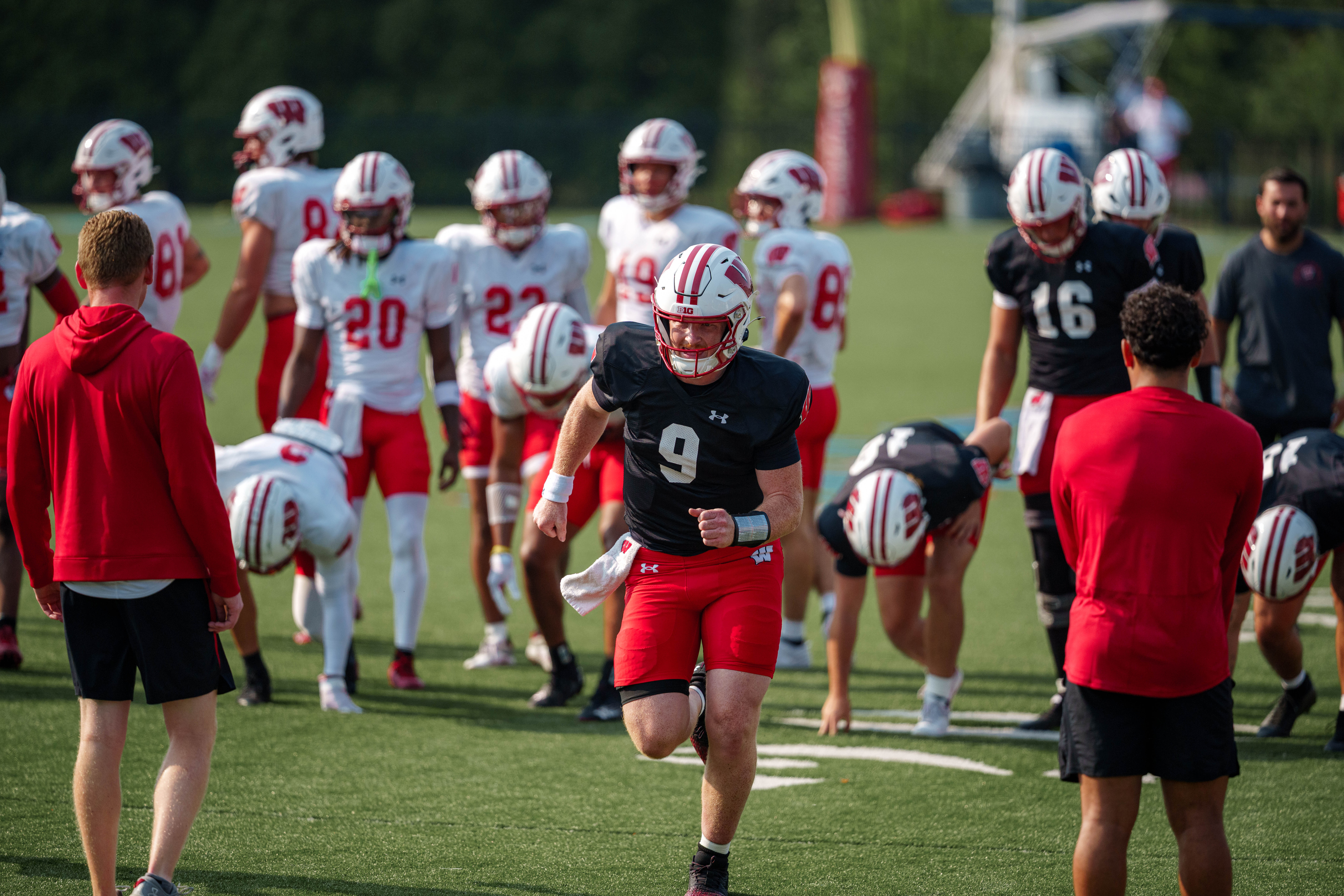 Wisconsin Badgers quarterback Billy Edwards Jr. (9) runs during training camp at Ralph E. Davis Pioneer Stadium on August 03, 2025 in Platteville, Wisconsin. Photography by Ross Harried for Second Crop Sports.