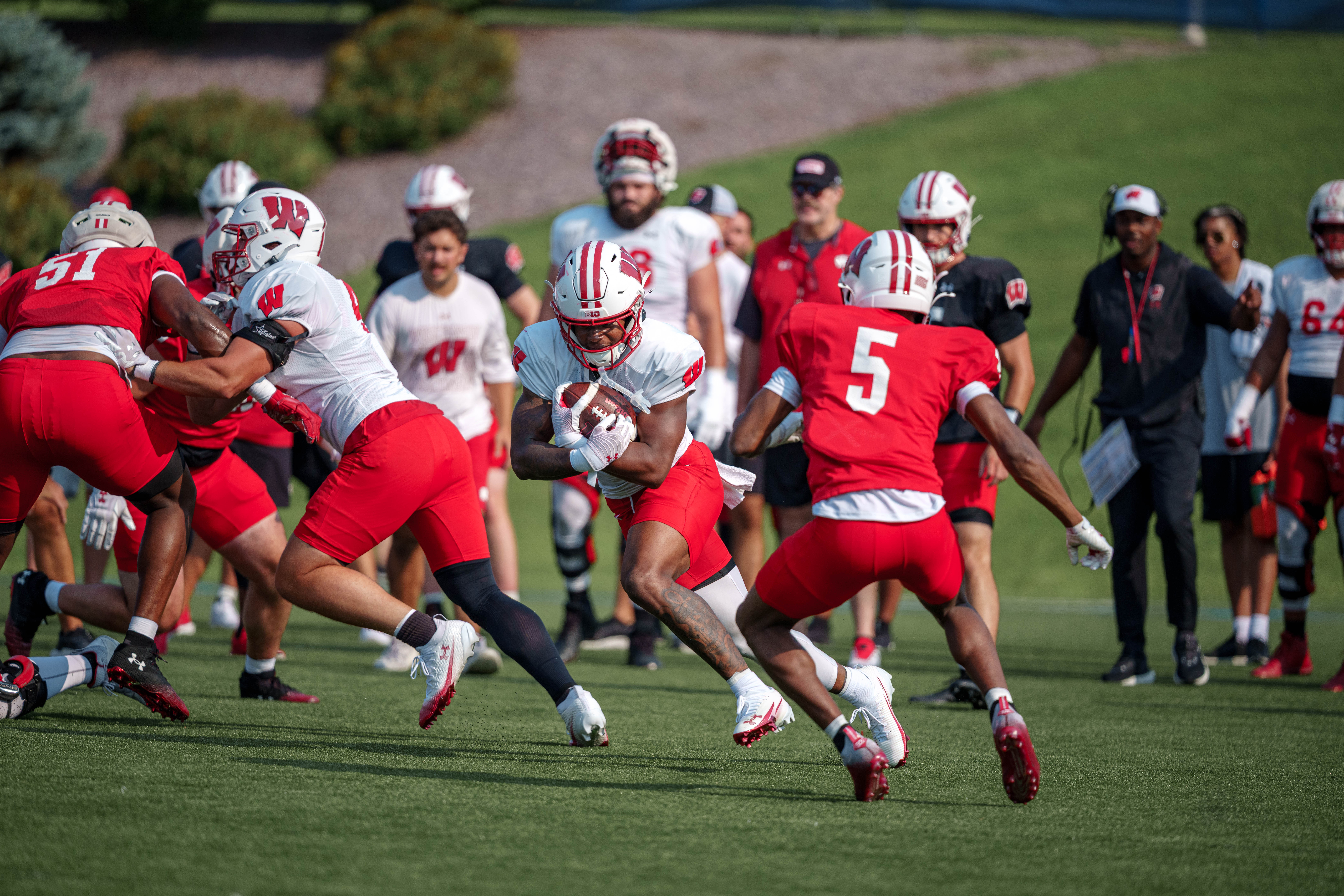 Wisconsin Badgers running back Dilin Jones (7) runs the ball during training camp at Ralph E. Davis Pioneer Stadium on August 03, 2025 in Platteville, Wisconsin. Photography by Ross Harried for Second Crop Sports.