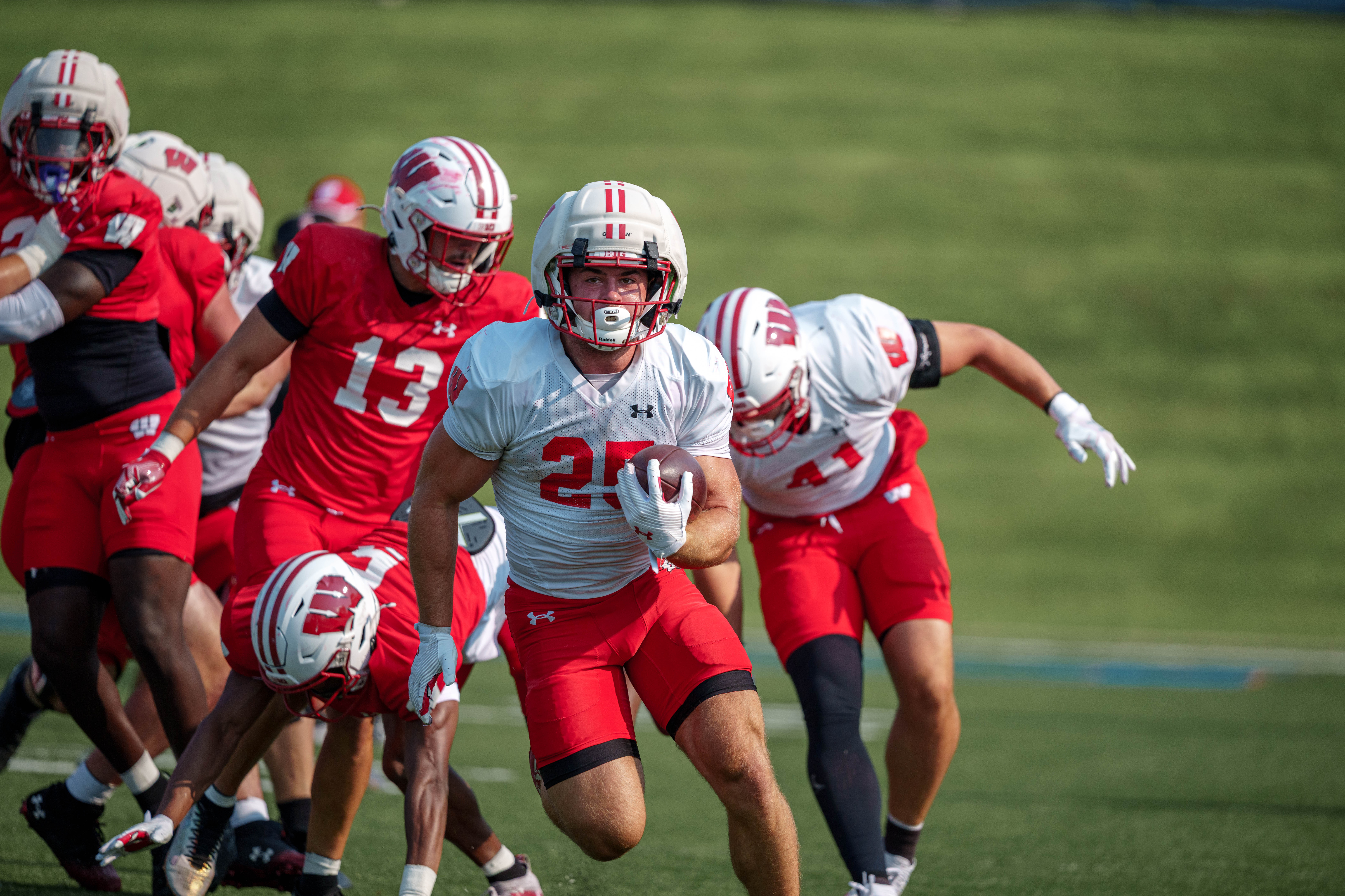 Wisconsin Badgers running back Cade Yacamelli (25) runs the ball during training camp at Ralph E. Davis Pioneer Stadium on August 03, 2025 in Platteville, Wisconsin. Photography by Ross Harried for Second Crop Sports.