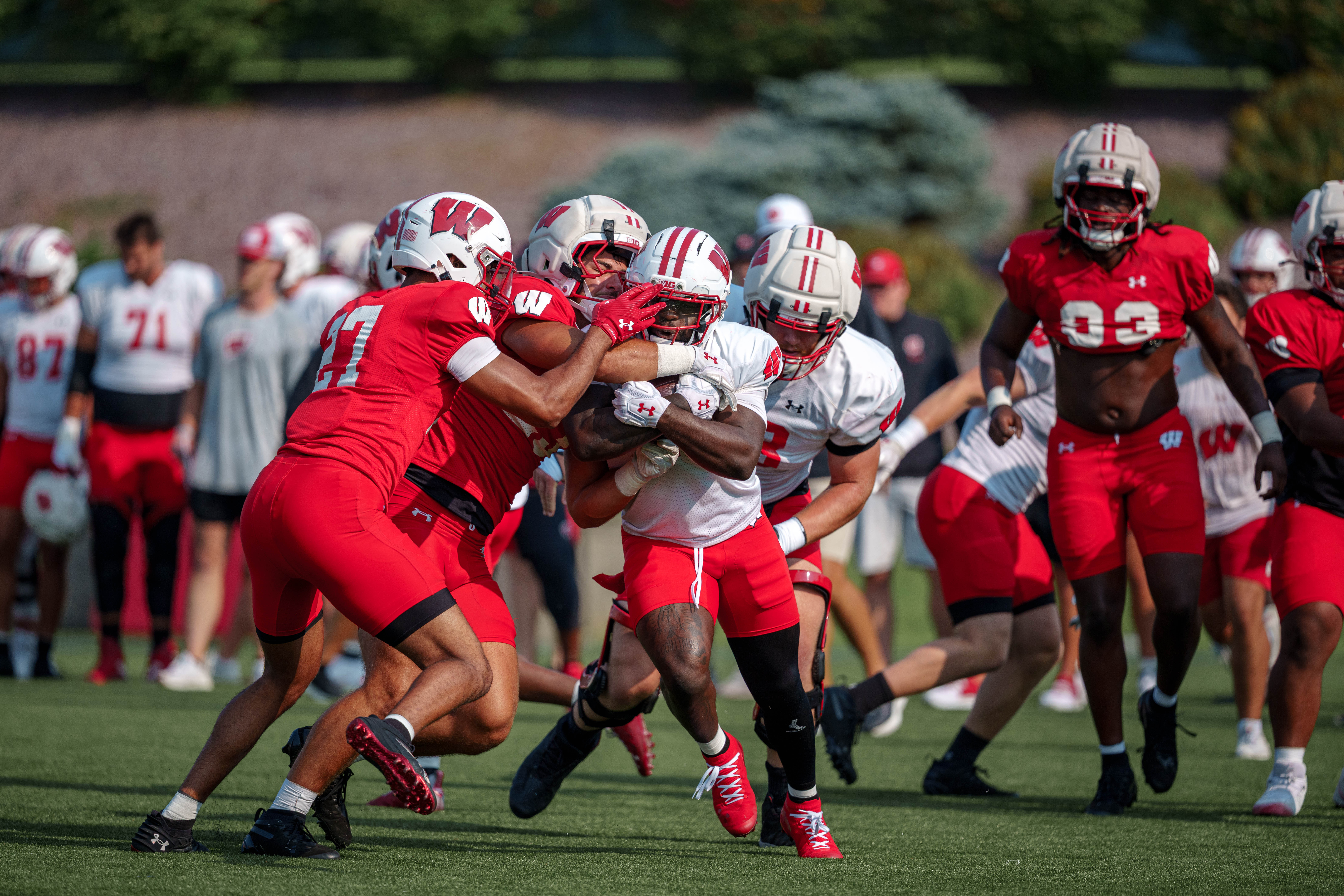 The Wisconsin Badgers Football team holds training camp at Ralph E. Davis Pioneer Stadium on August 03, 2025 in Platteville, Wisconsin. Photography by Ross Harried for Second Crop Sports.