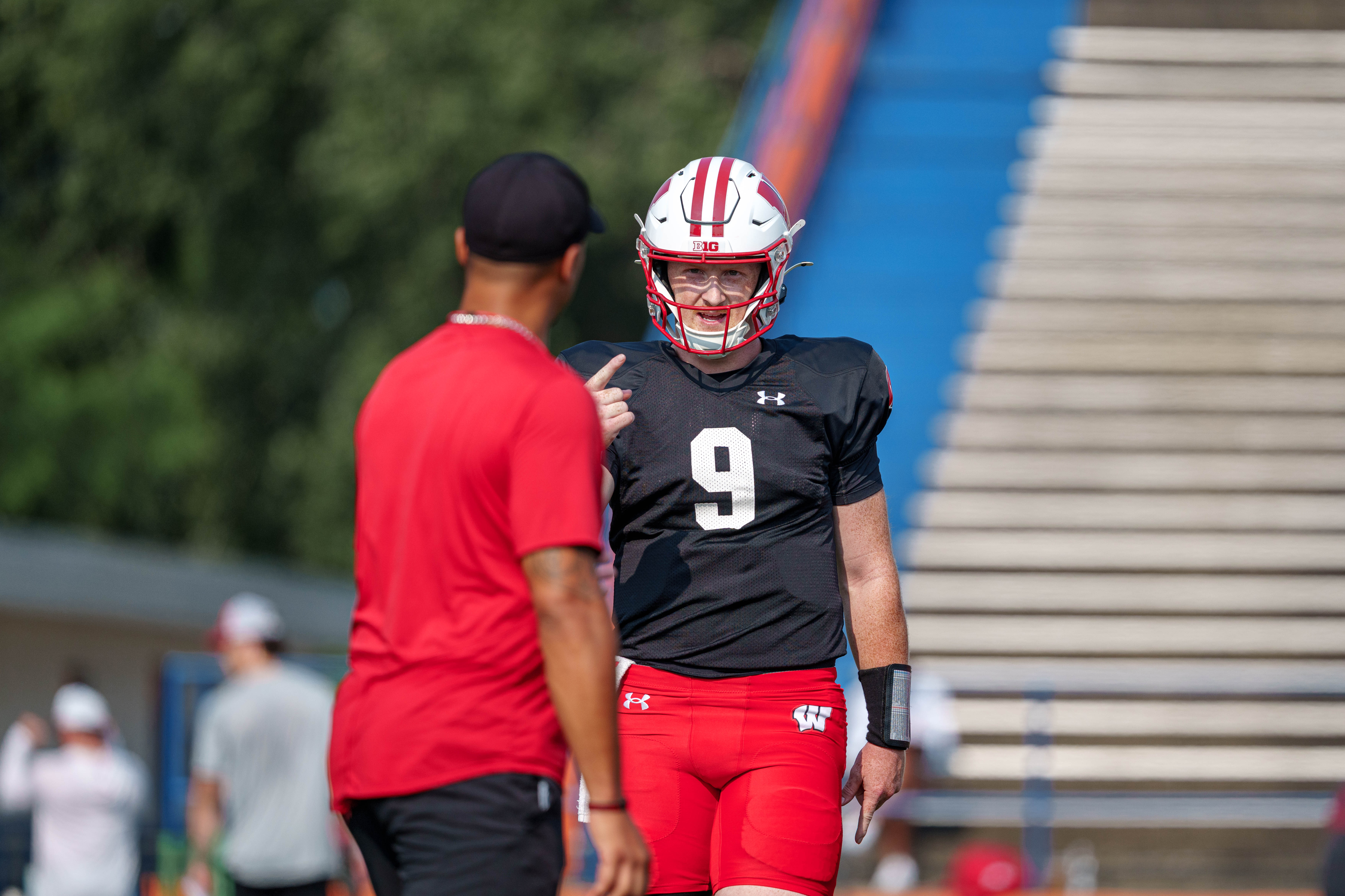 Wisconsin Badgers quarterback Billy Edwards Jr. (9) signals to a coach during training camp at Ralph E. Davis Pioneer Stadium on August 03, 2025 in Platteville, Wisconsin. Photography by Ross Harried for Second Crop Sports.