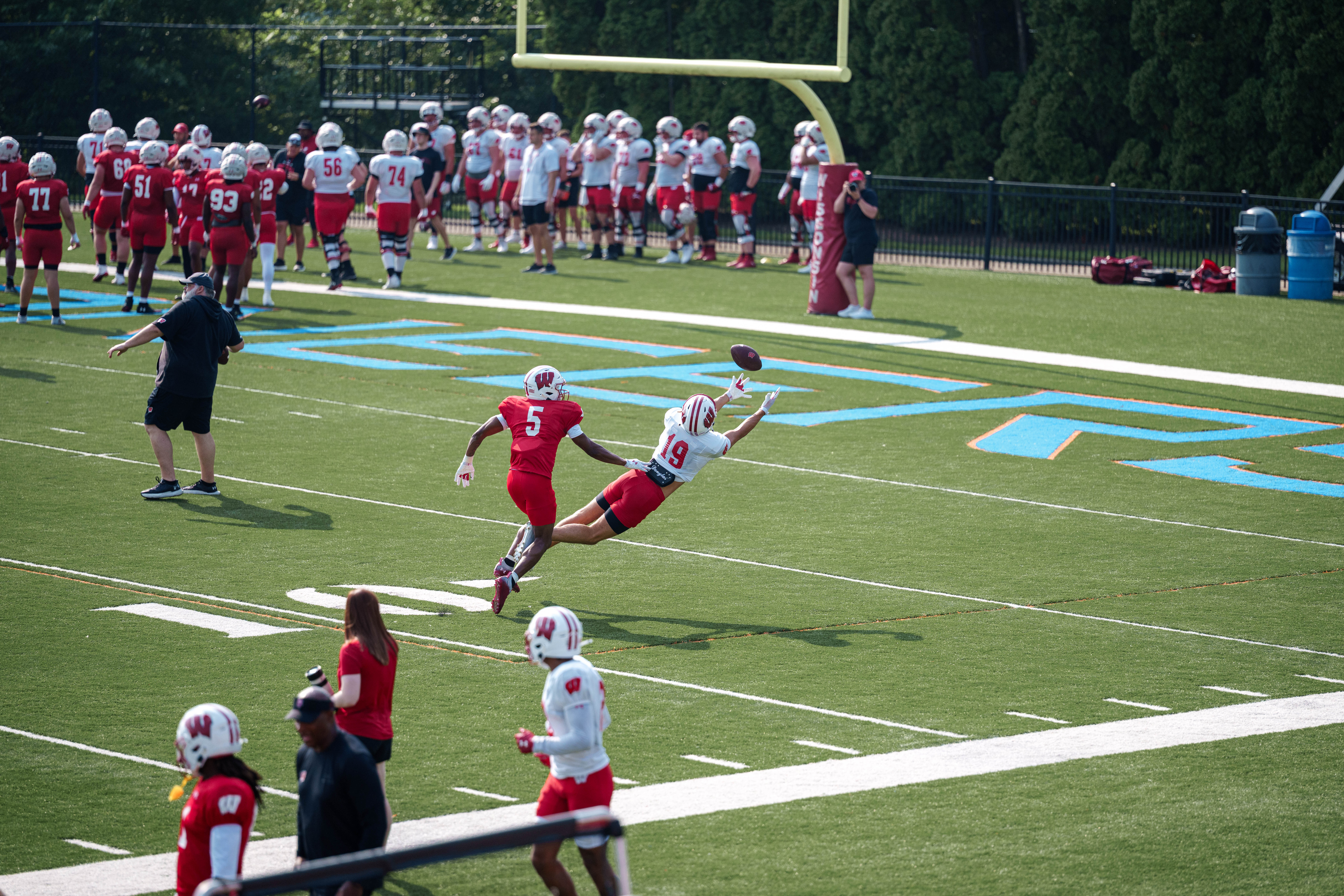 Wisconsin Badgers wide receiver Langdon Nordgaard (19) attempts a diving catch during training camp at Ralph E. Davis Pioneer Stadium on August 03, 2025 in Platteville, Wisconsin. Photography by Ross Harried for Second Crop Sports.