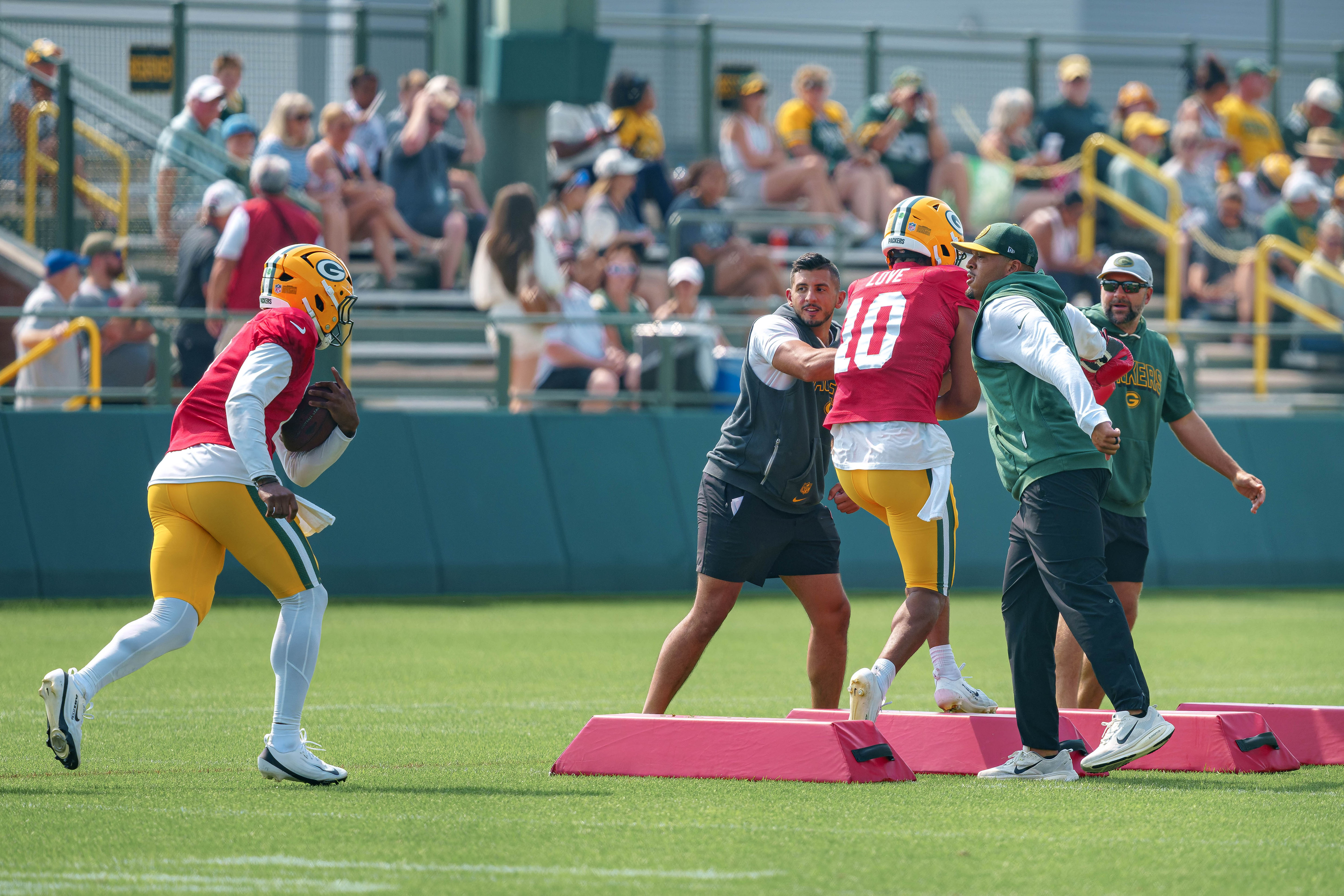 Green Bay Packers quarterbacks, Malik Willis (left) and Jordan Love (10) run drills during training camp at Ray Nitschke Field in Green Bay, Wisconsin, on August 6th, 2025. Photography by Ross Harried for Second Crop Sports.