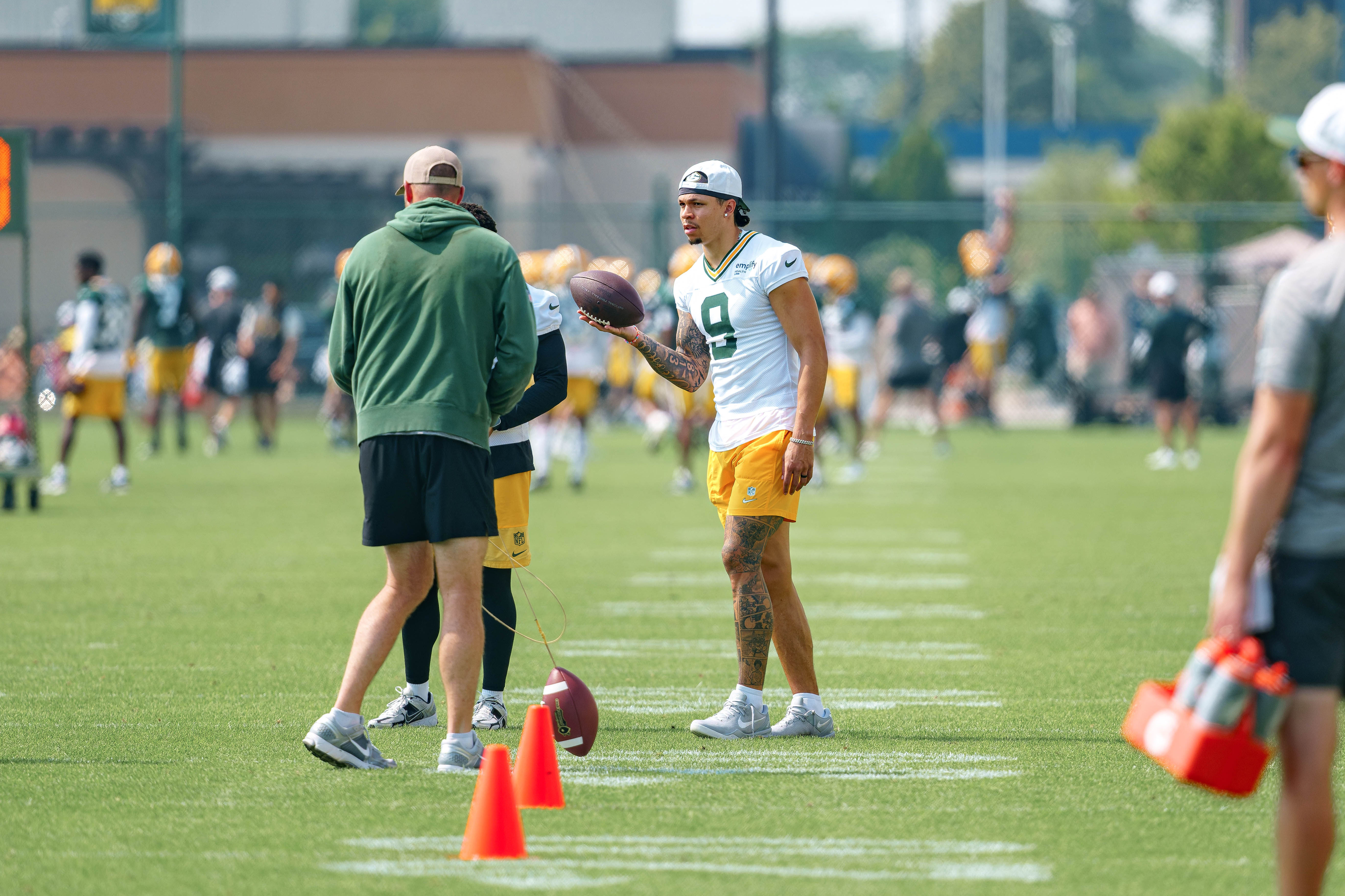 Green Bay Packers wide receiver Christian Watson (9) watches drills during NFL training camp at Ray Nitschke Field in Green Bay, Wisconsin, on August 6th, 2025. Photography by Ross Harried for Second Crop Sports.