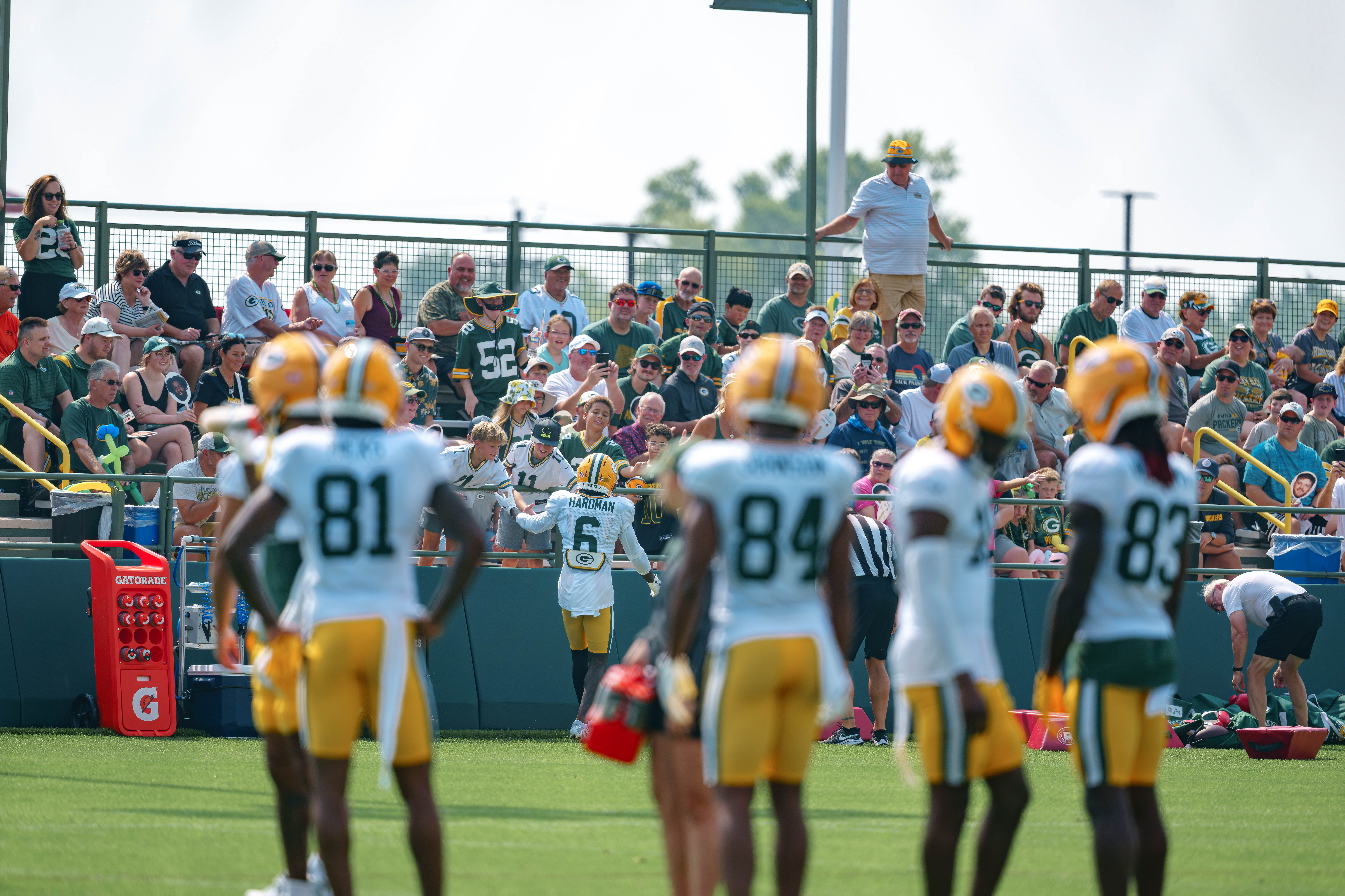 Green Bay Packers wide receiver Mecole Hardman (6) interacts with fans during NFL training camp at Ray Nitschke Field in Green Bay, Wisconsin, on August 6th, 2025. Photography by Ross Harried for Second Crop Sports.