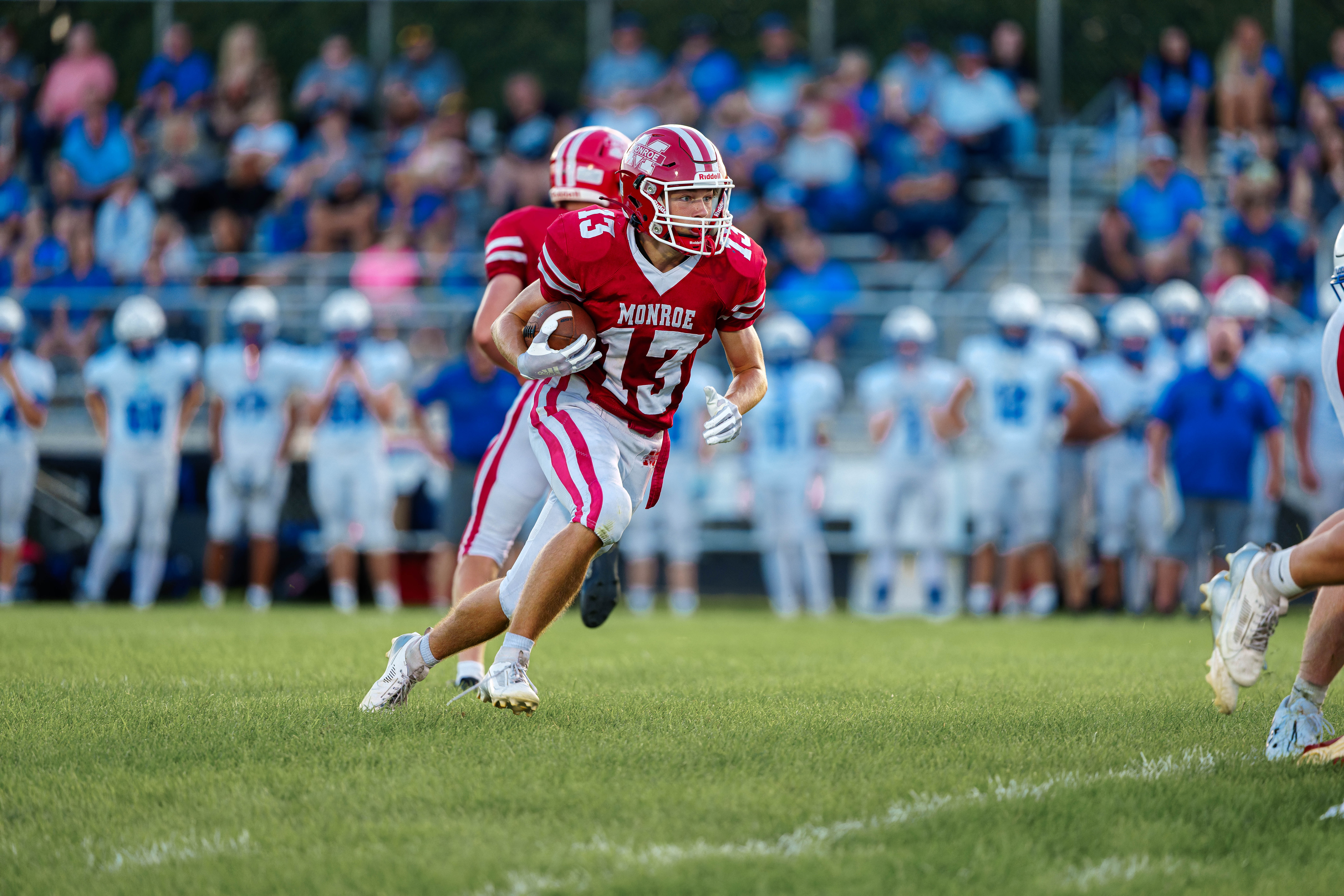The Monroe Cheesemakers host the Lodi Blue Devils in a high school football game at Monroe High School in Monroe, Wisconsin, on August 22, 2025. Lodi defeated Monroe 21–14. Photography by Ross Harried for Second Crop Sports.