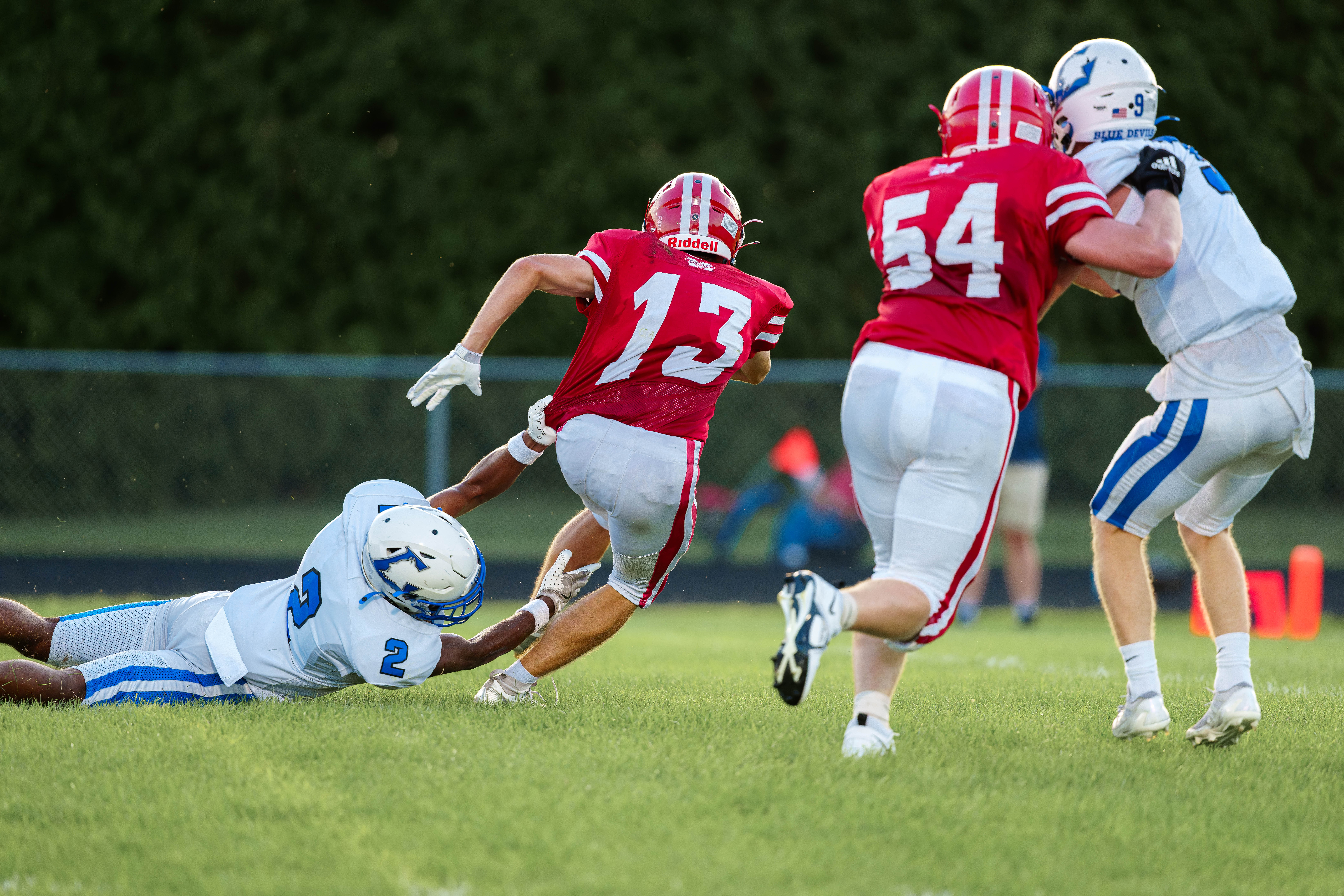 The Monroe Cheesemakers host the Lodi Blue Devils in a high school football game at Monroe High School in Monroe, Wisconsin, on August 22, 2025. Lodi defeated Monroe 21–14. Photography by Ross Harried for Second Crop Sports.