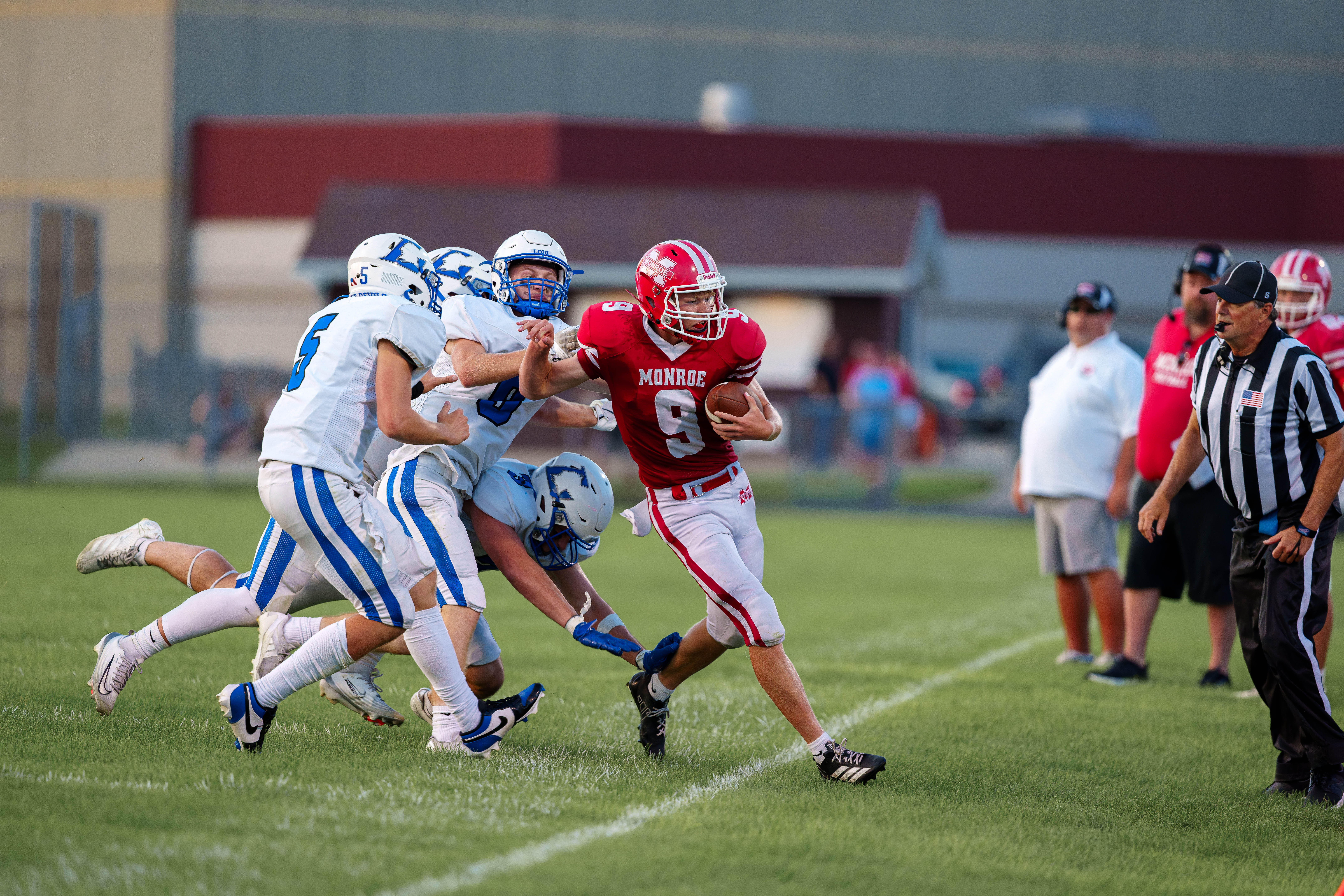 The Monroe Cheesemakers host the Lodi Blue Devils in a high school football game at Monroe High School in Monroe, Wisconsin, on August 22, 2025. Lodi defeated Monroe 21–14. Photography by Ross Harried for Second Crop Sports.
