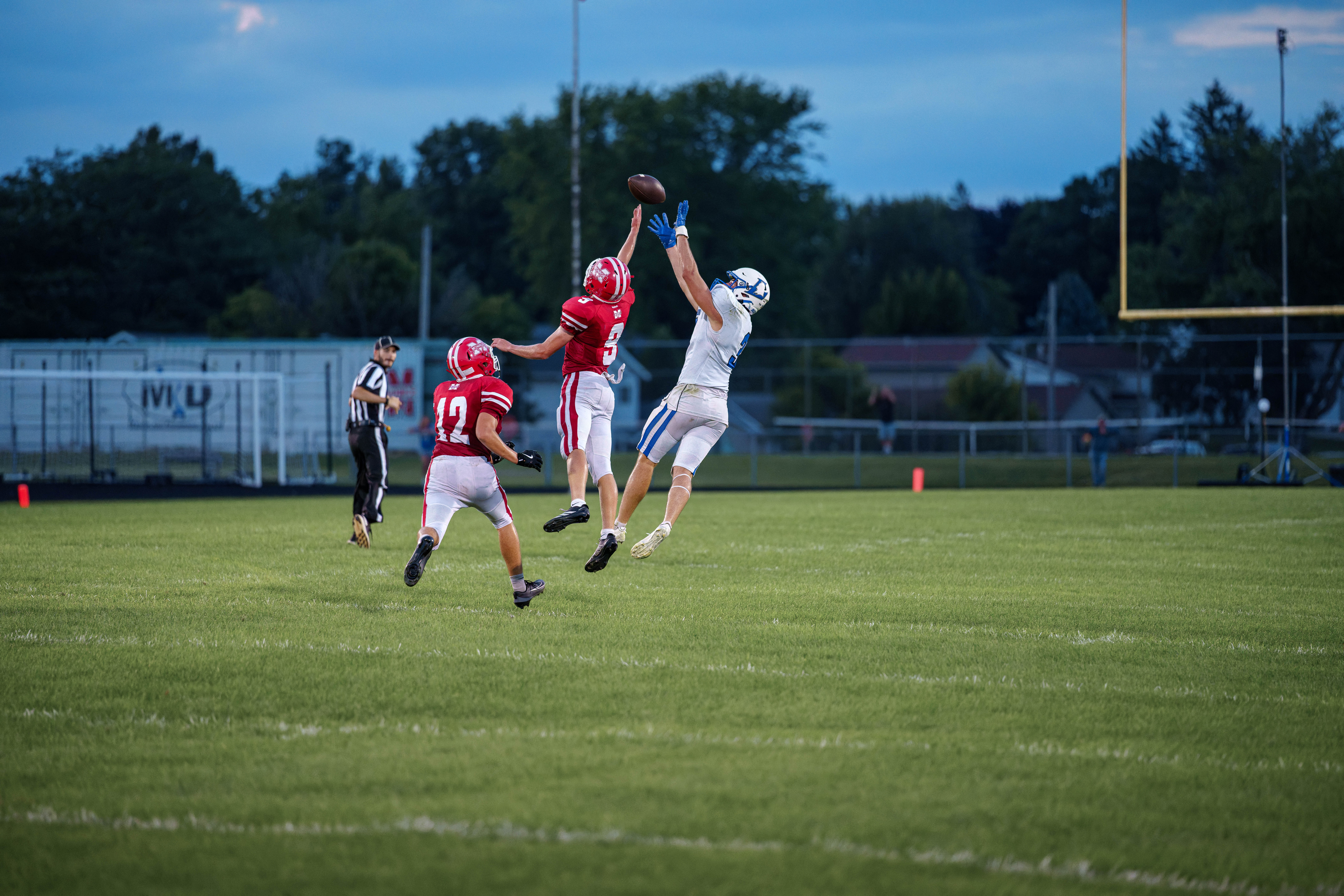 The Monroe Cheesemakers host the Lodi Blue Devils in a high school football game at Monroe High School in Monroe, Wisconsin, on August 22, 2025. Lodi defeated Monroe 21–14. Photography by Ross Harried for Second Crop Sports.