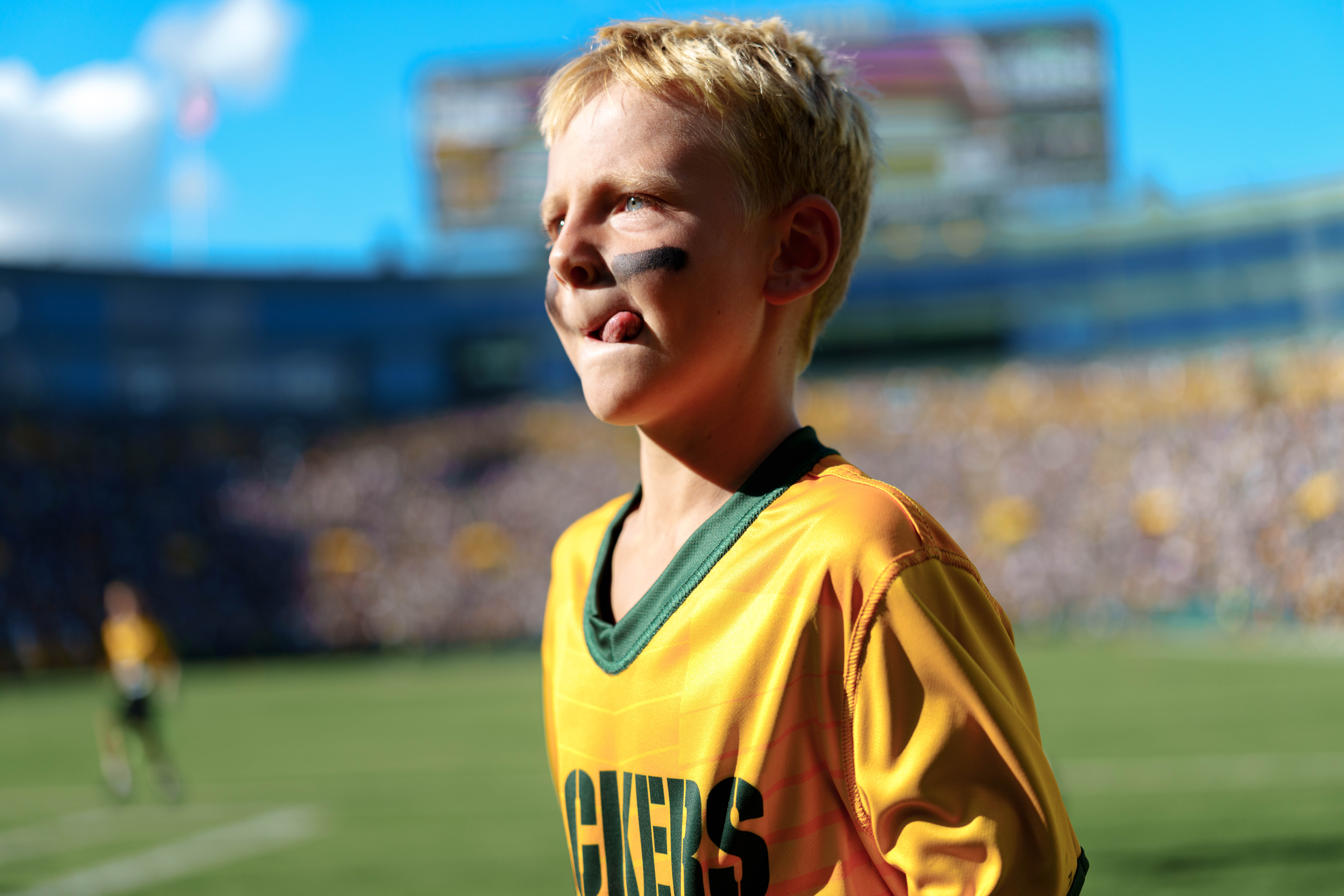 The Verona Area flag football team takes the field during halftime of an NFL preseason game between the Green Bay Packers and Seattle Seahawks at Lambeau Field in Green Bay, Wisconsin, on August 23, 2025. Photography by Ross Harried for Second Crop Sports.