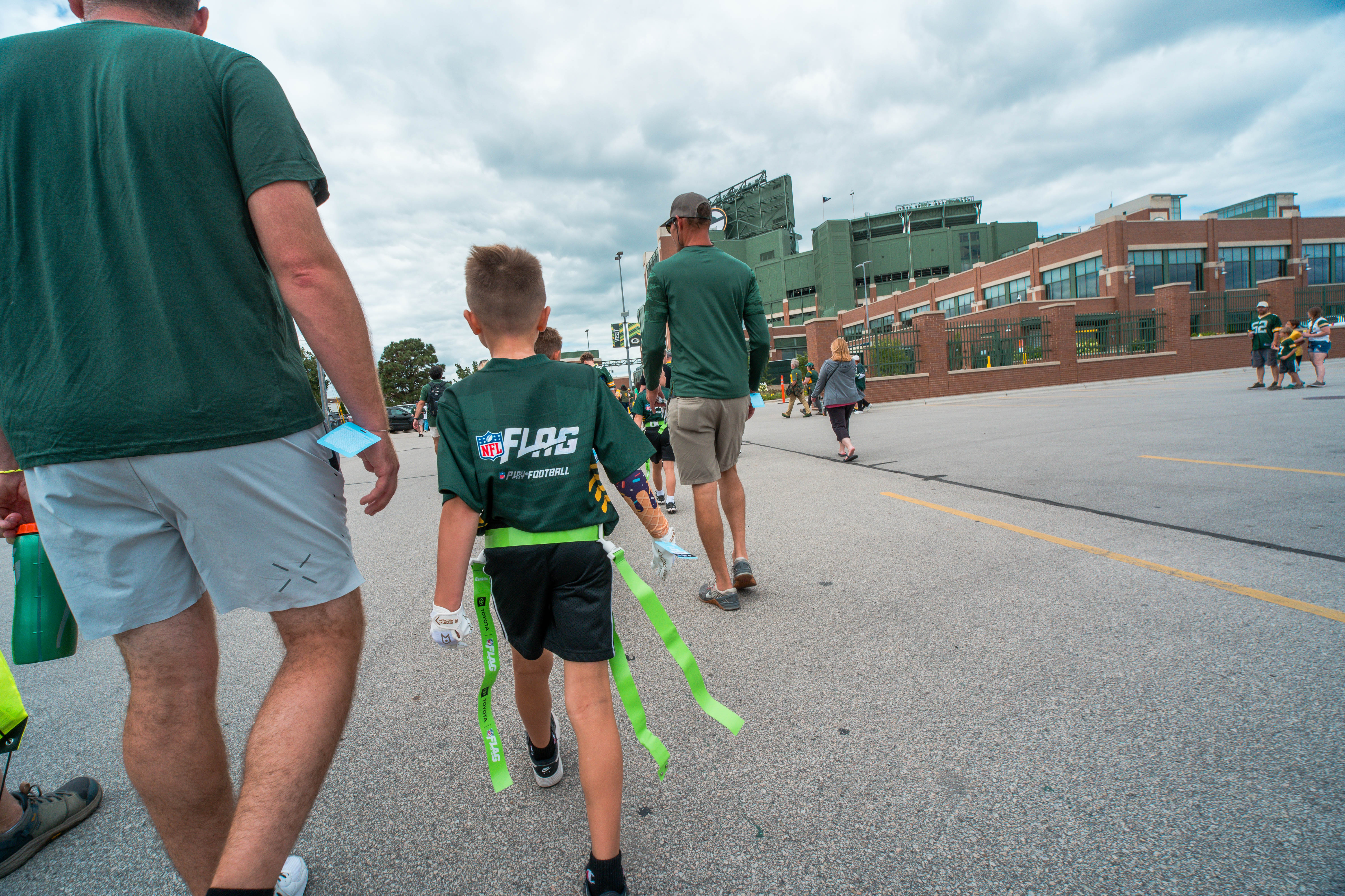 The Verona Area flag football team visits Lambeau Field in Green Bay, Wisconsin, ahead of their halftime game during the NFL preseason matchup between the Green Bay Packers and Seattle Seahawks on August 23, 2025. Photography by Ross Harried for Second Crop Sports.