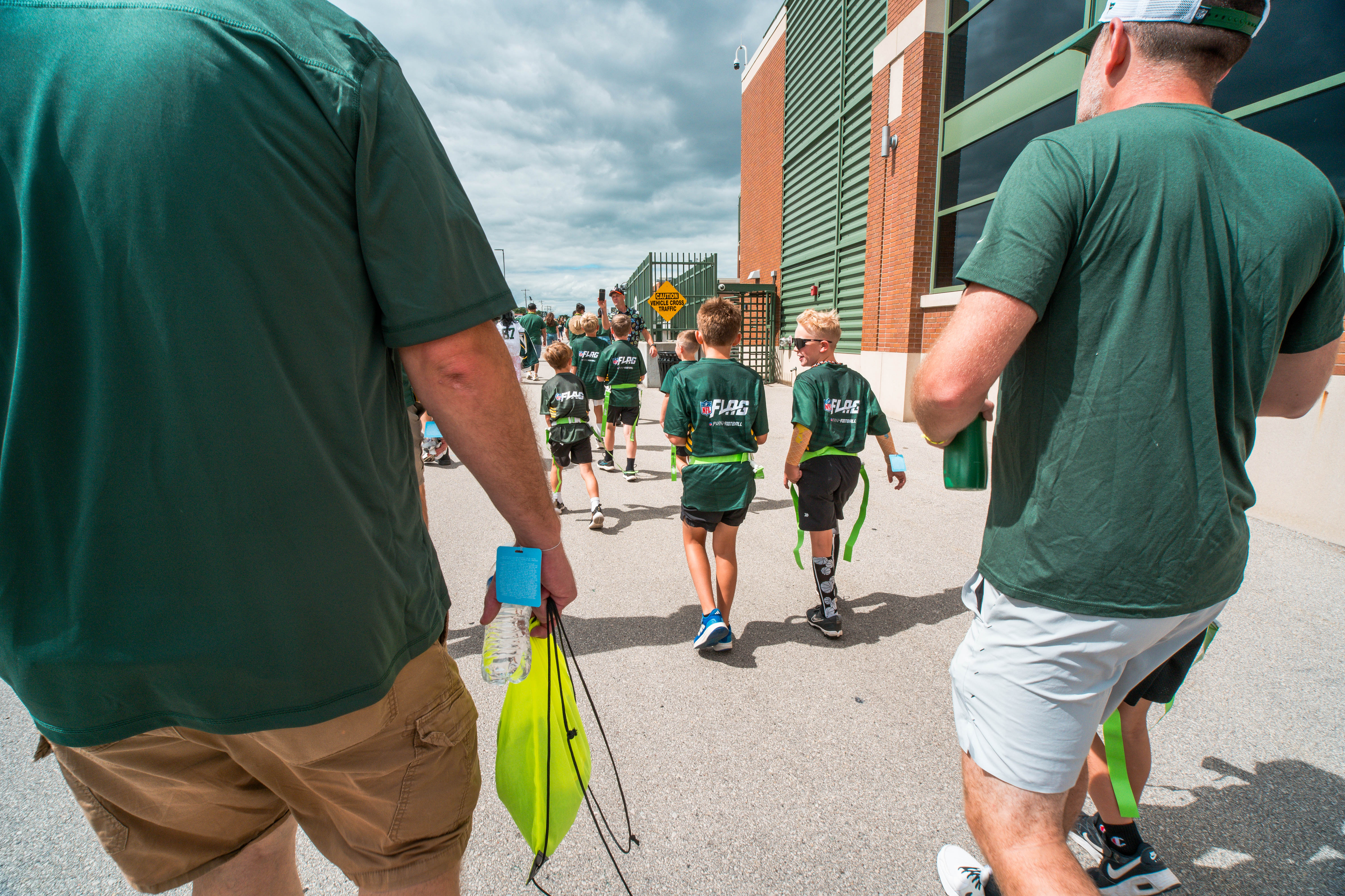 The Verona Area flag football team visits Lambeau Field in Green Bay, Wisconsin, ahead of their halftime game during the NFL preseason matchup between the Green Bay Packers and Seattle Seahawks on August 23, 2025. Photography by Ross Harried for Second Crop Sports.