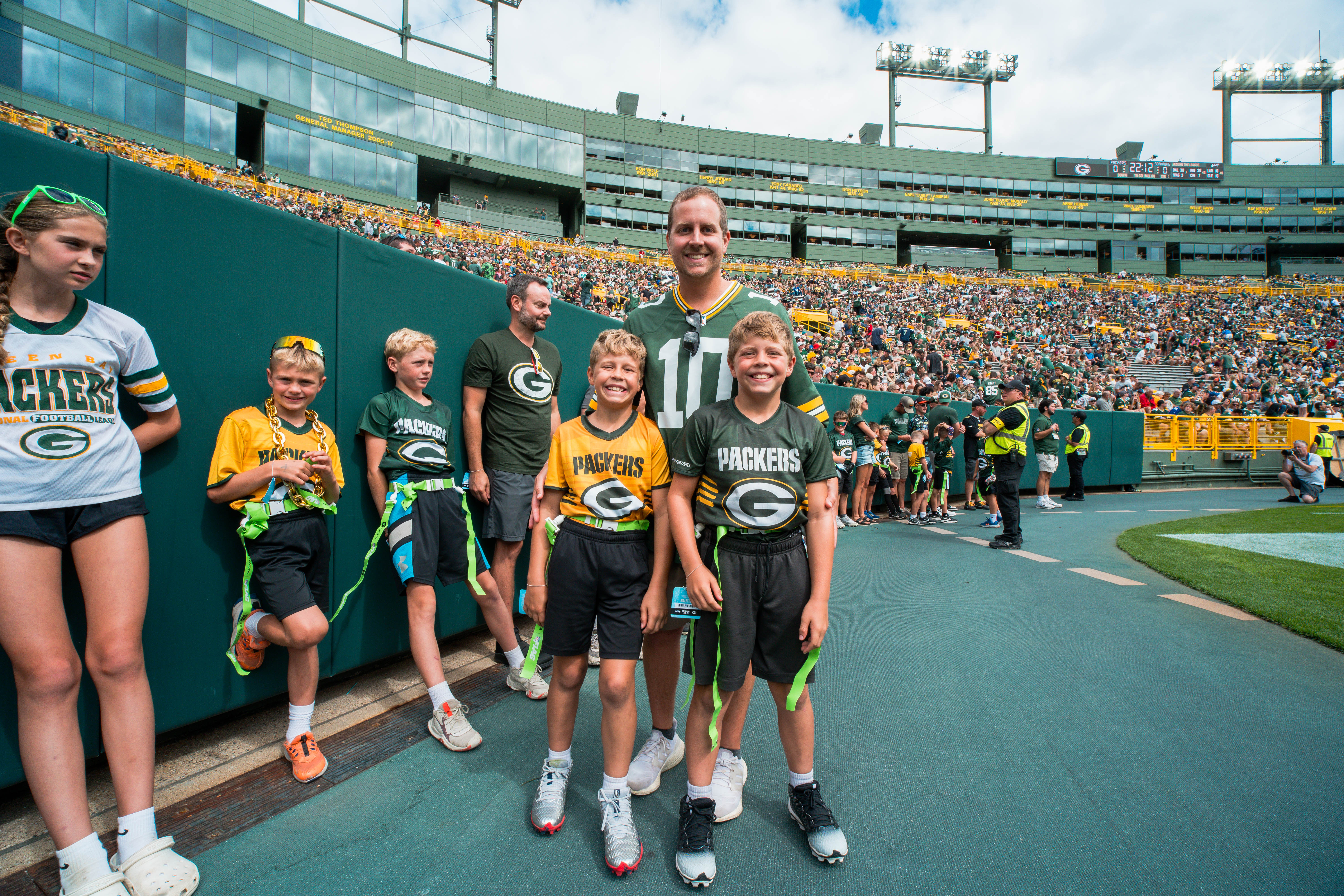 The Verona Area flag football team visits Lambeau Field in Green Bay, Wisconsin, ahead of their halftime game during the NFL preseason matchup between the Green Bay Packers and Seattle Seahawks on August 23, 2025. Photography by Ross Harried for Second Crop Sports.
