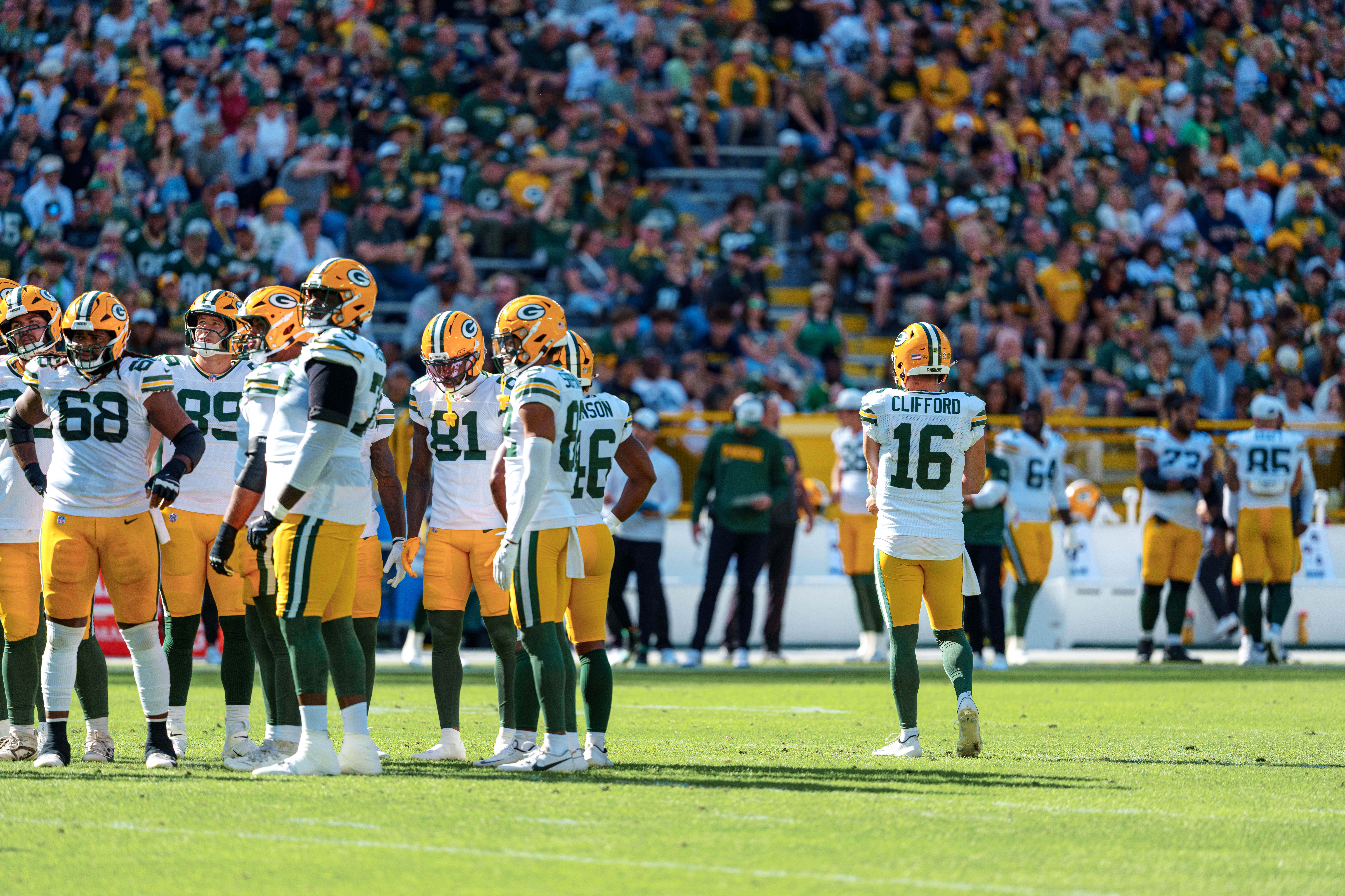 Green Bay Packers quarterback Sean Clifford (16) takes a play from the sidelines in the second quarter against the Seattle Seahawks at Lambeau Field on August 23, 2025 in Green Bay, Wisconsin. Photography by Ross Harried for Second Crop Sports.