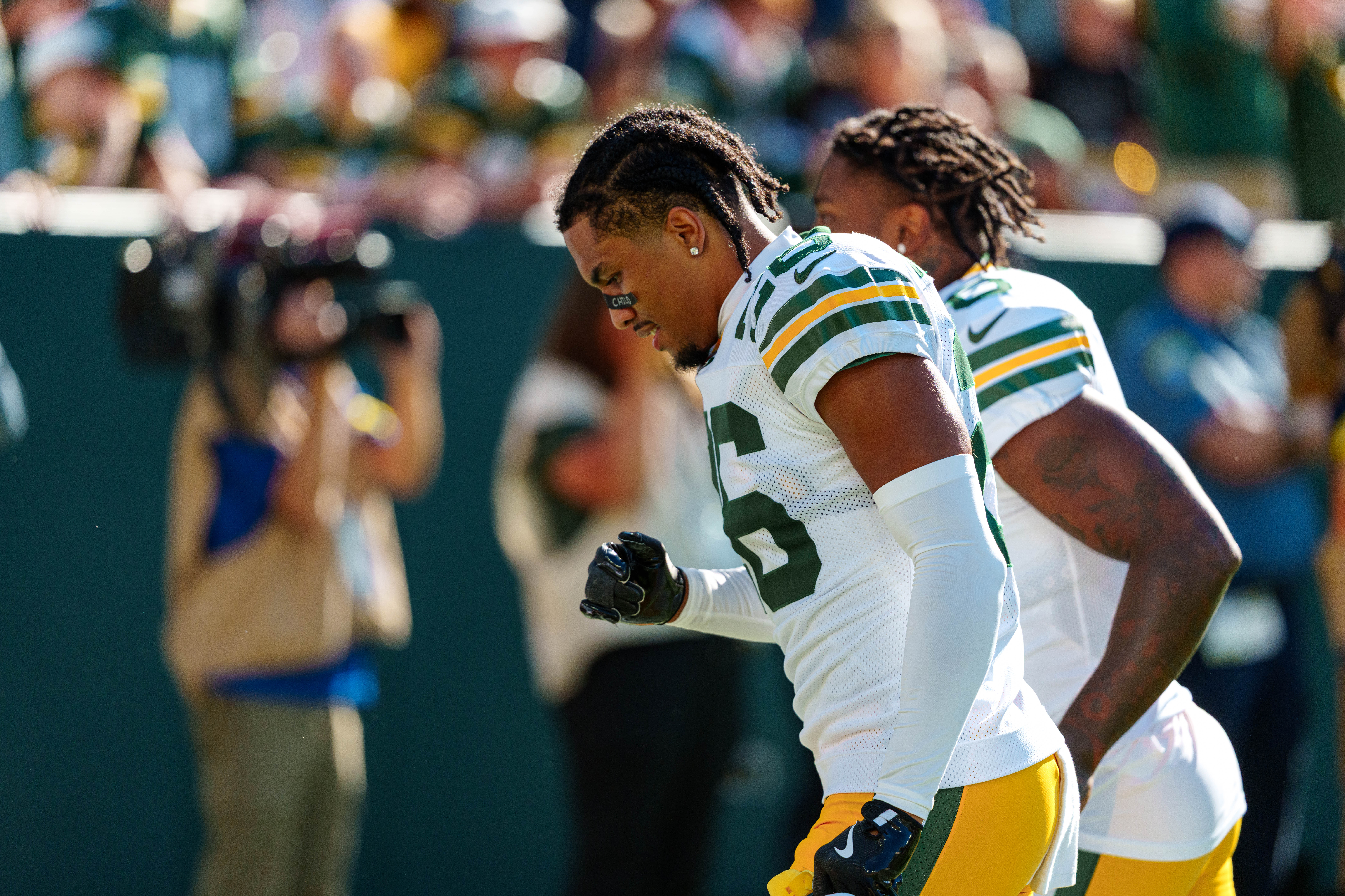 Green Bay Packers cornerback Micah Robinson (26) heads to the locker room at halftime against the Seattle Seahawks at Lambeau Field on August 23, 2025 in Green Bay, Wisconsin. Photography by Ross Harried for Second Crop Sports.