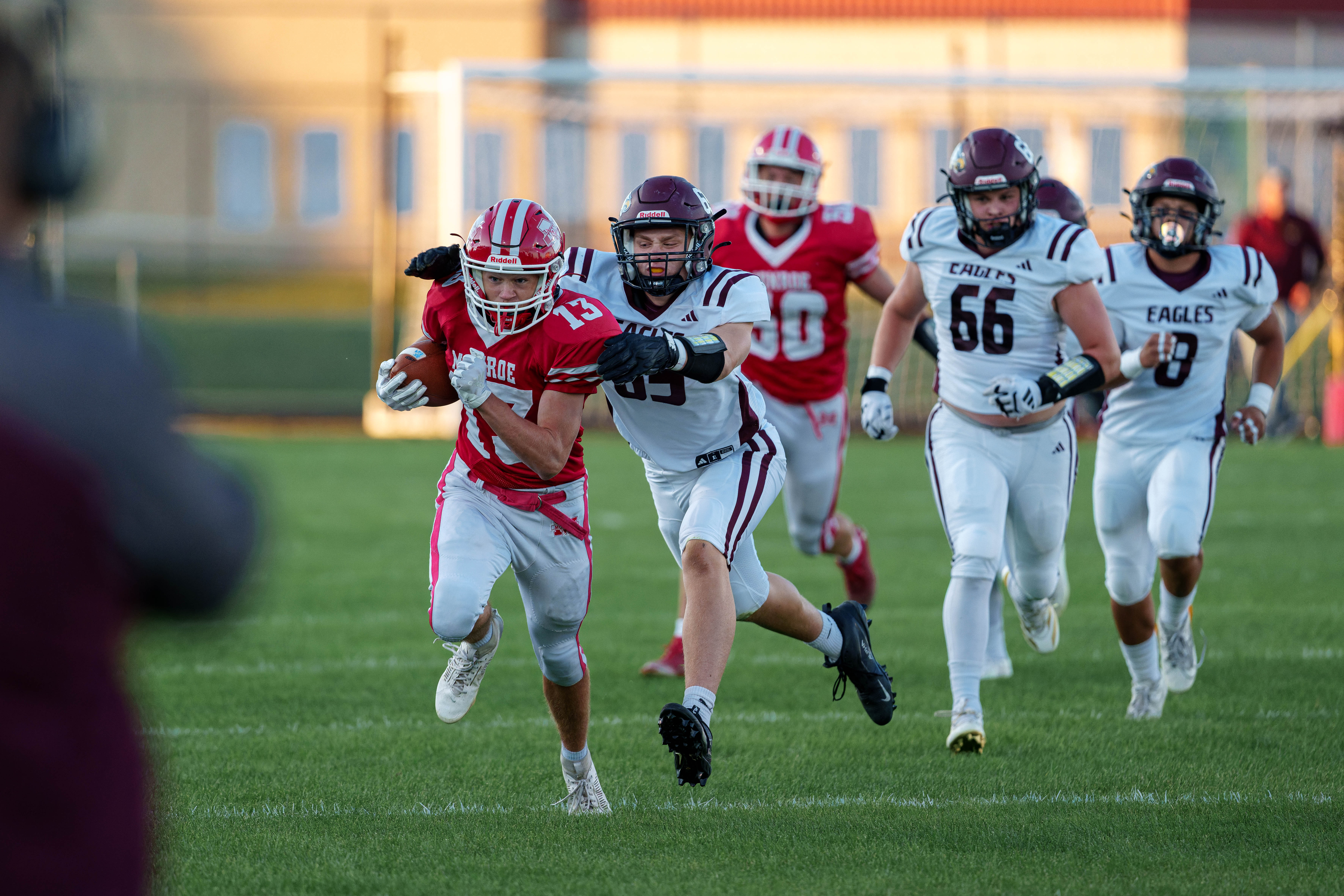 MONROE, WI – SEPTEMBER 5: A high school football game between the Monroe Cheesemakers and the Jefferson Eagles at the Monroe High School in Monroe, Wisconsin. Photography by Ross Harried for Second Crop Sports.