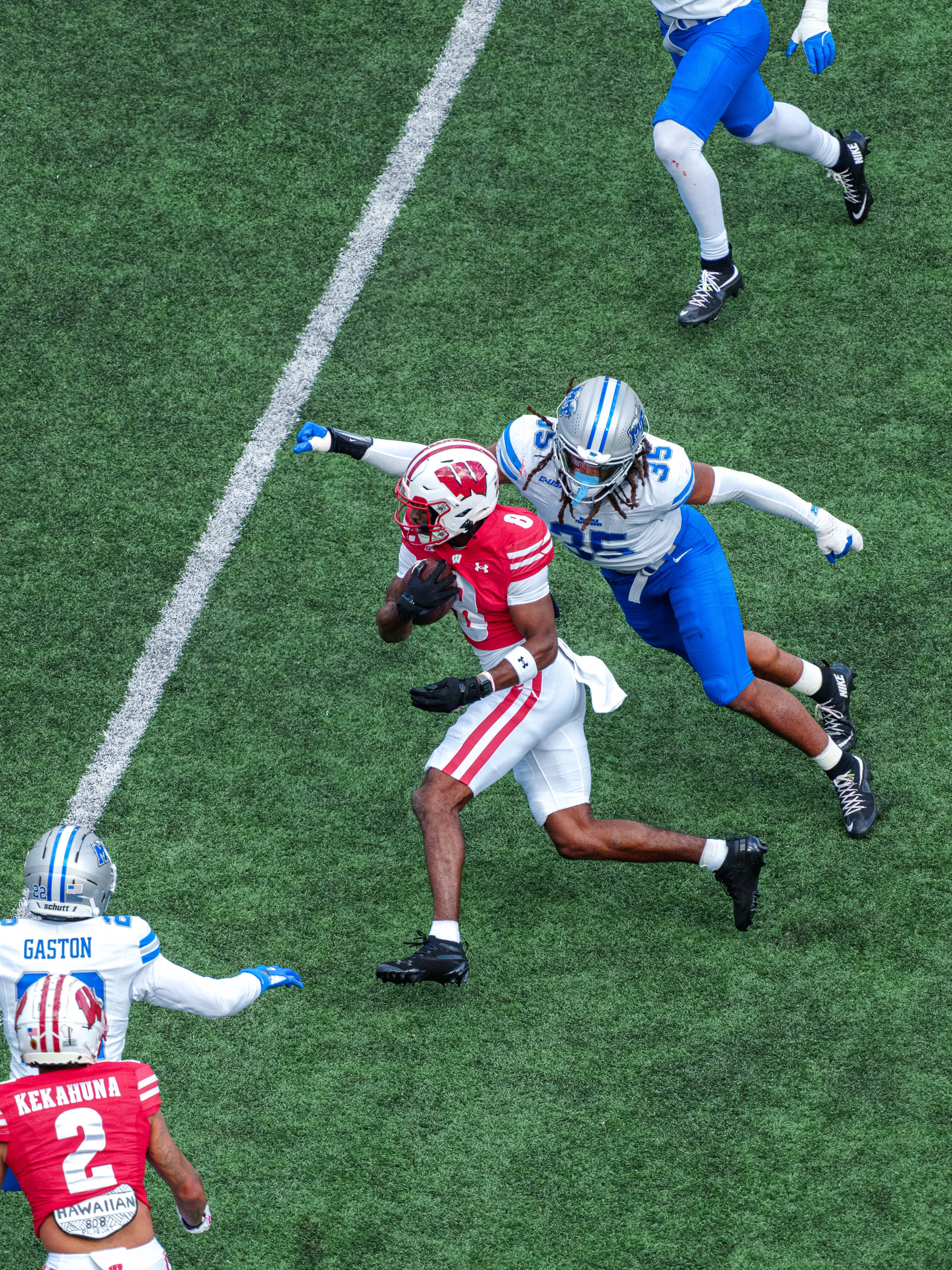 Sept 6, 2025; Madison, Wisconsin, USA; Wisconsin Badgers wide receiver Vinny Anthony II (8) runs the ball after a catch durning a college football game between the Wisconsin Badgers and the Middle Tennessee Blue Raiders at Camp Randall Stadium on September 06, 2025 in Madison, Wisconsin. Photography by Ross Harried for Second Crop Sports.
