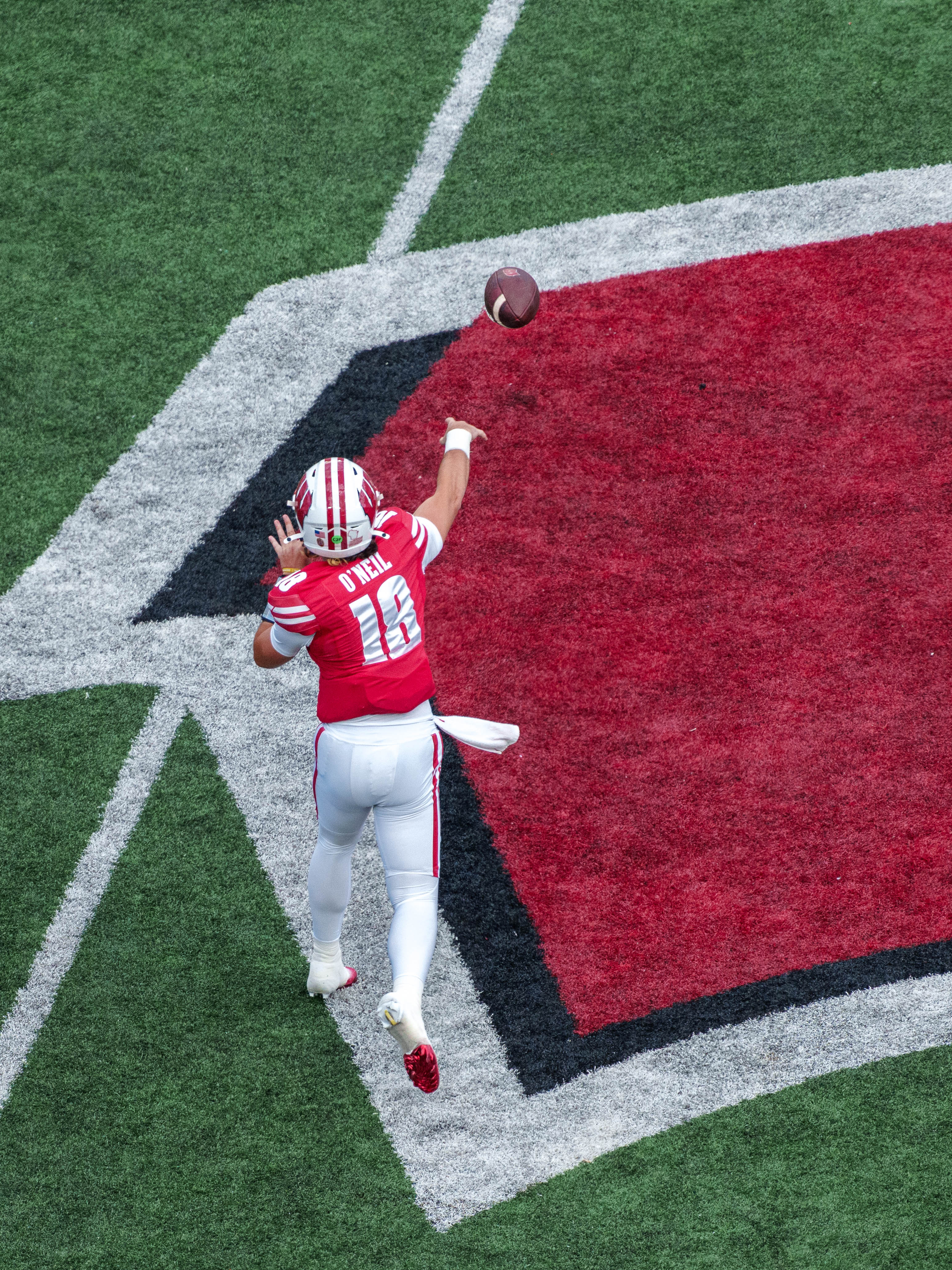 Sept 6, 2025; Madison, Wisconsin, USA; Wisconsin Badgers quarterback Danny O'Neil (18) attempts a pass durning a college football game between the Wisconsin Badgers and the Middle Tennessee Blue Raiders at Camp Randall Stadium on September 06, 2025 in Madison, Wisconsin. Photography by Ross Harried for Second Crop Sports.