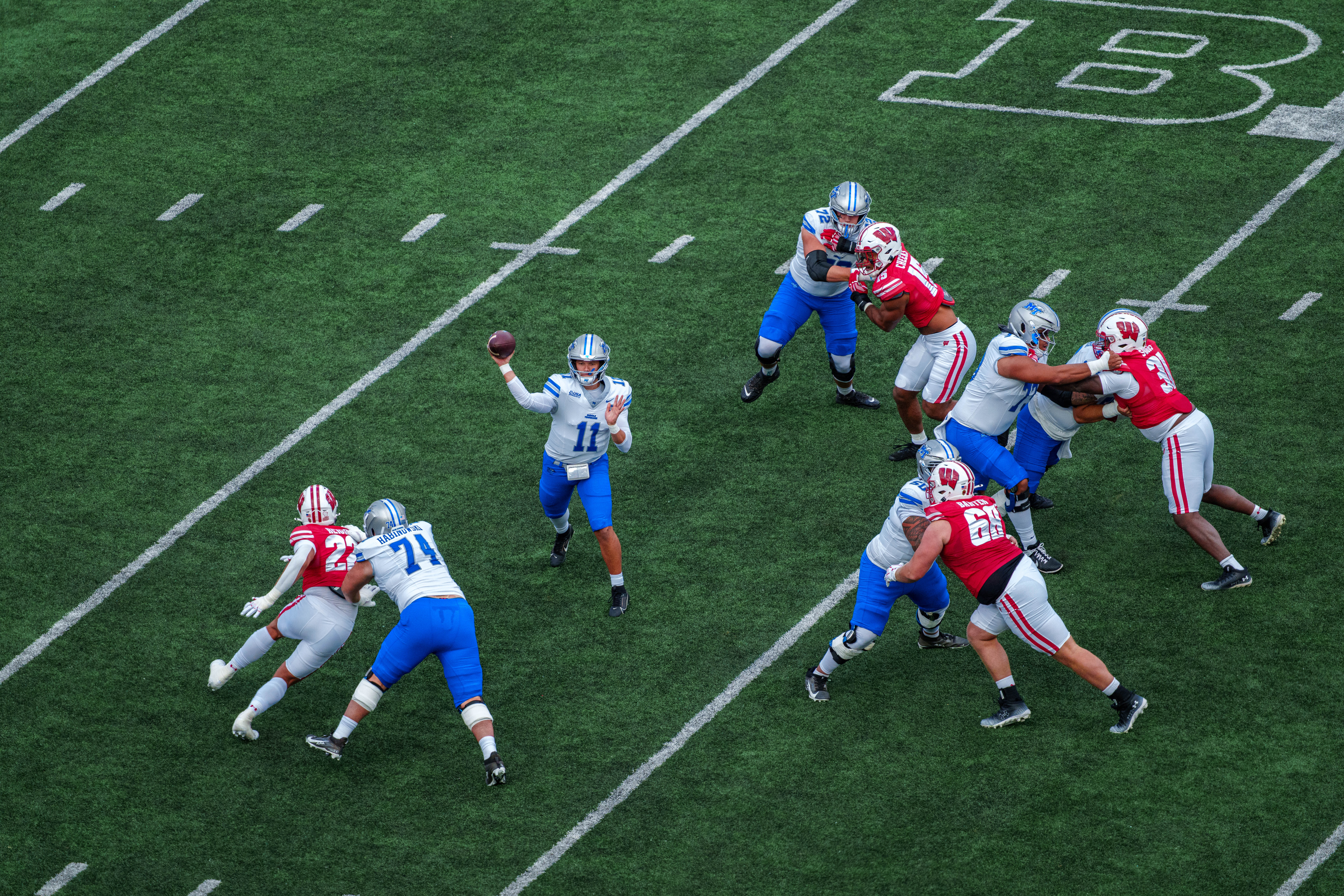 Sept 6, 2025; Madison, Wisconsin, USA; Middle Tennessee Blue Raiders quarterback Nicholas Vattiato (11) attempts a pass durning a college football game between the Wisconsin Badgers and the Middle Tennessee Blue Raiders at Camp Randall Stadium on September 06, 2025 in Madison, Wisconsin. Photography by Ross Harried for Second Crop Sports.