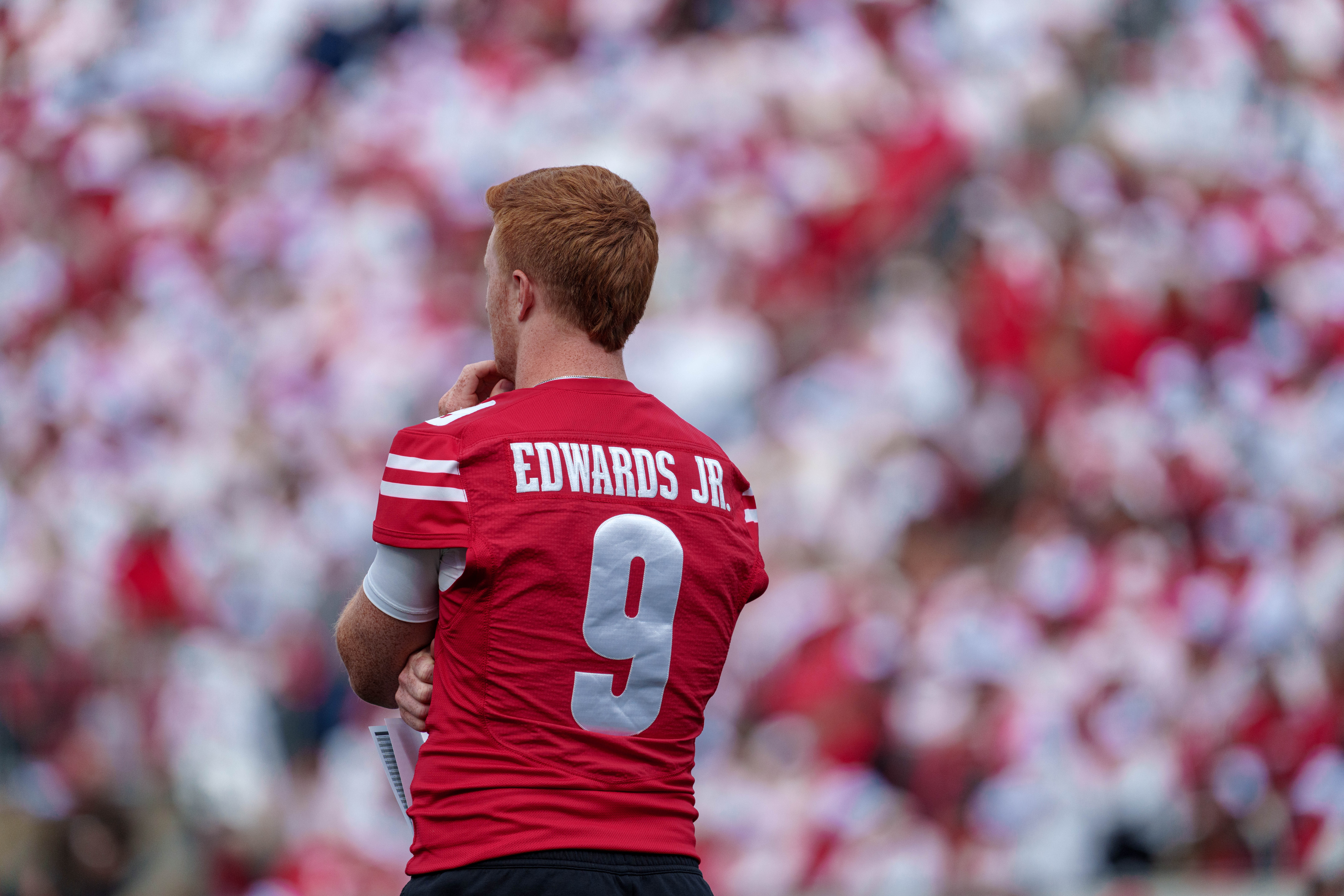 Sept 6, 2025; Madison, Wisconsin, USA; Wisconsin Badgers quarterback Billy Edwards Jr. (9) watches from the sideline durning a college football game between the Wisconsin Badgers and the Middle Tennessee Blue Raiders at Camp Randall Stadium on September 06, 2025 in Madison, Wisconsin. Photography by Ross Harried for Second Crop Sports.