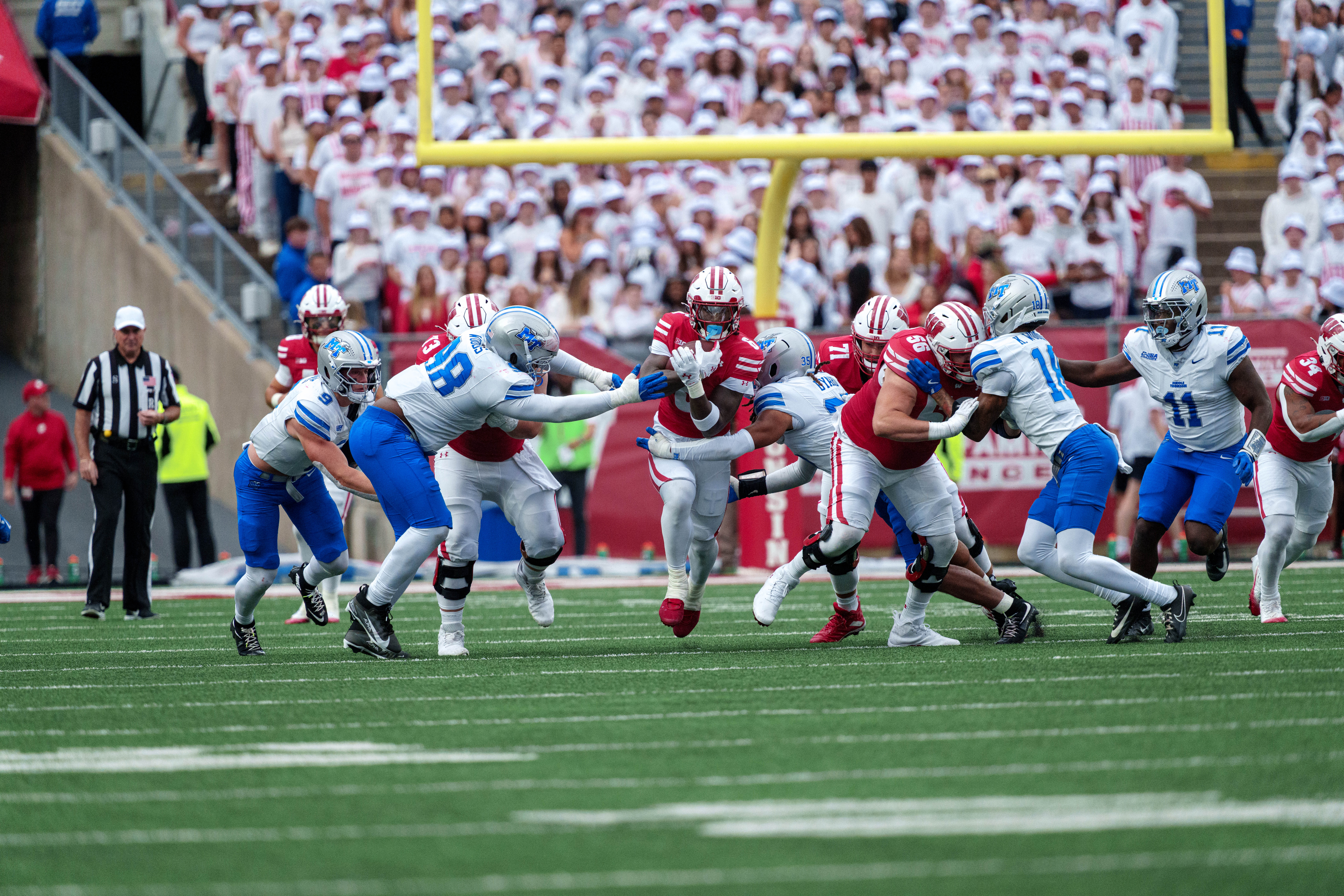 Sept 6, 2025; Madison, Wisconsin, USA; Wisconsin Badgers running back Darrion Dupree (6) find a gap durning a college football game between the Wisconsin Badgers and the Middle Tennessee Blue Raiders at Camp Randall Stadium on September 06, 2025 in Madison, Wisconsin. Photography by Ross Harried for Second Crop Sports.