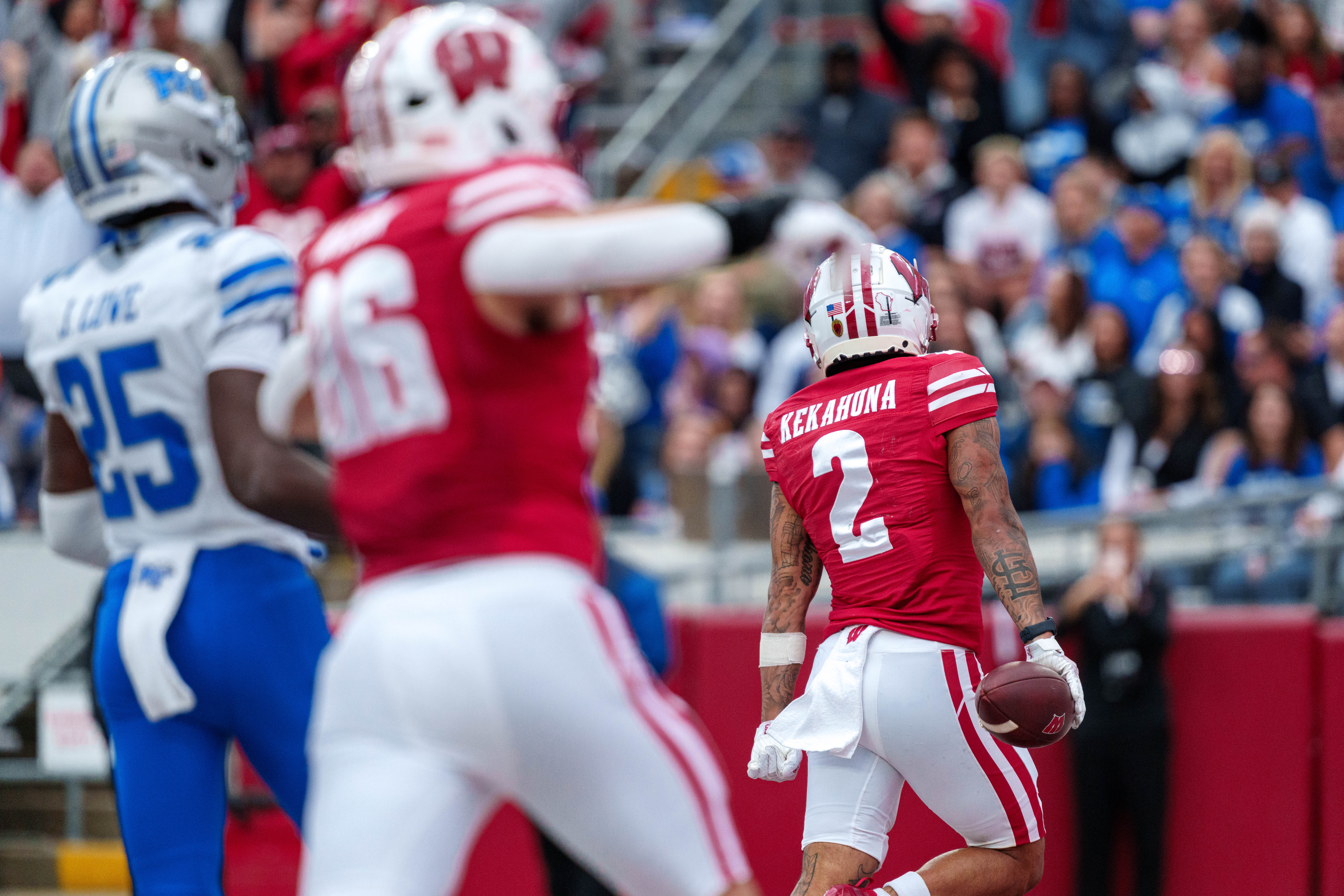 Sept 6, 2025; Madison, Wisconsin, USA; Wisconsin Badgers wide receiver Trech Kekahuna (2) celebrates a touchdown durning a college football game between the Wisconsin Badgers and the Middle Tennessee Blue Raiders at Camp Randall Stadium on September 06, 2025 in Madison, Wisconsin. Photography by Ross Harried for Second Crop Sports.