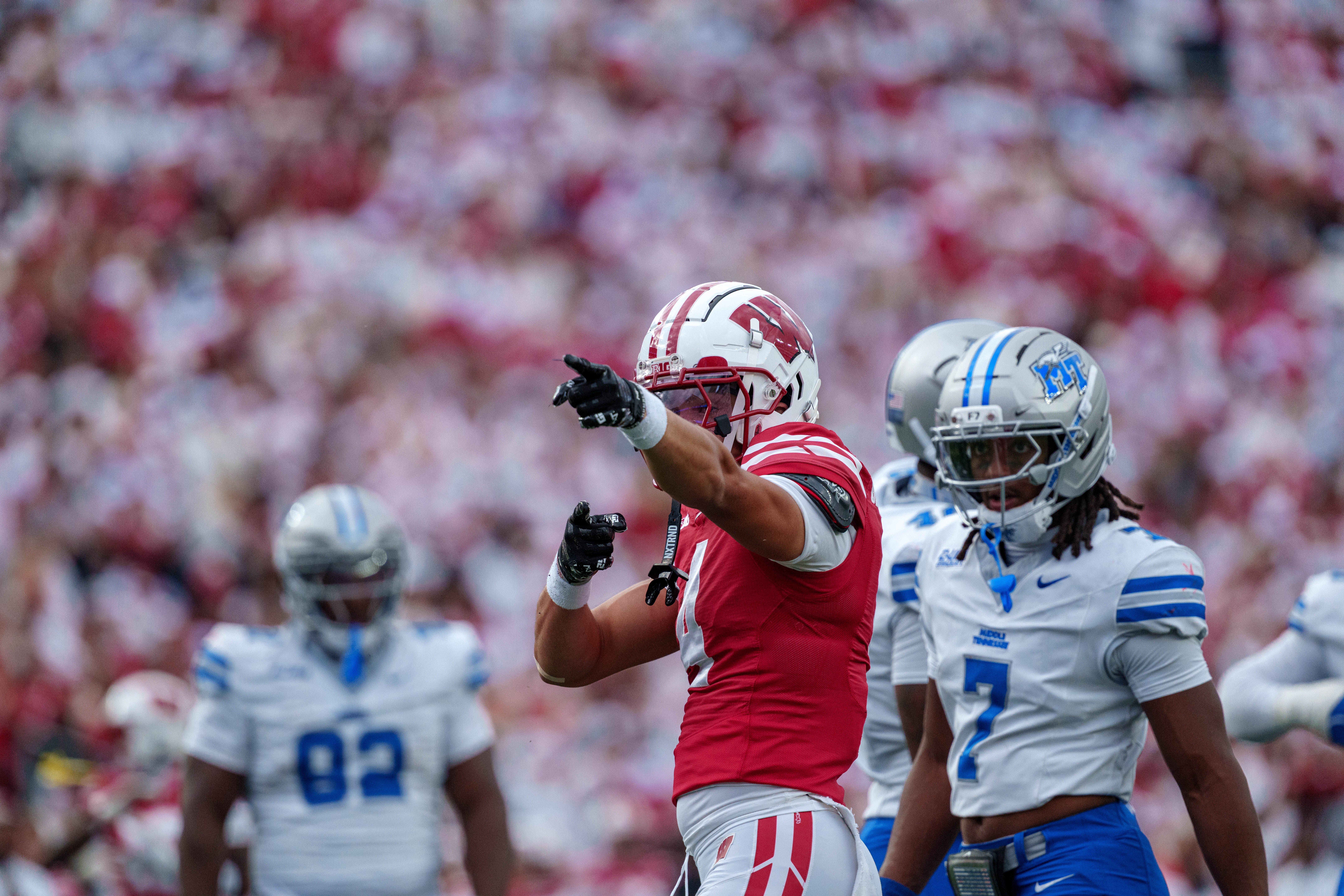 Sept 6, 2025; Madison, Wisconsin, USA; Wisconsin Badgers wide receiver Jayden Ballard (4) celebrates after the play durning a college football game between the Wisconsin Badgers and the Middle Tennessee Blue Raiders at Camp Randall Stadium on September 06, 2025 in Madison, Wisconsin. Photography by Ross Harried for Second Crop Sports.