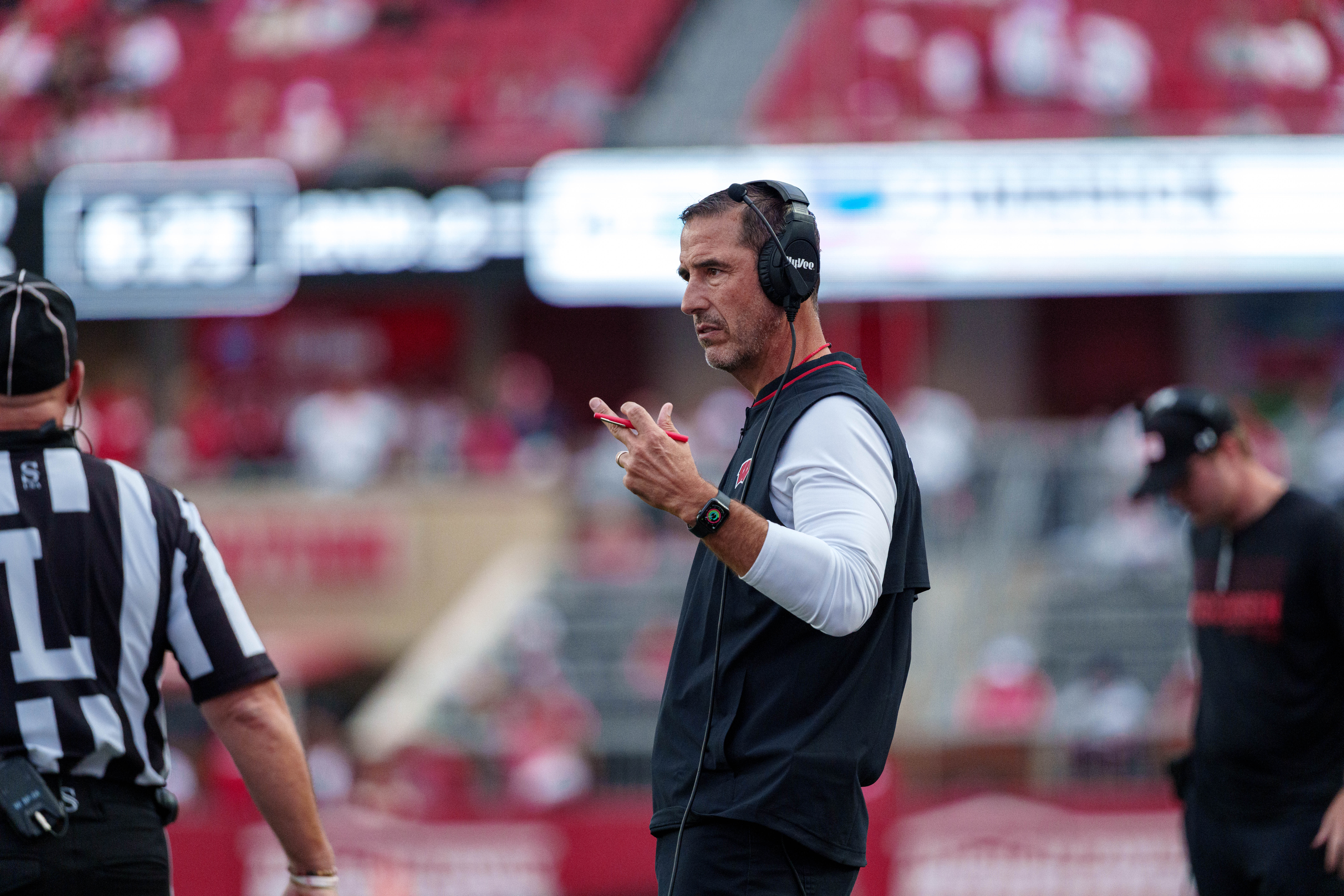 Sept 6, 2025; Madison, Wisconsin, USA; Wisconsin Badgers head coach Luke Fickell signals towards the official durning a college football game between the Wisconsin Badgers and the Middle Tennessee Blue Raiders at Camp Randall Stadium on September 06, 2025 in Madison, Wisconsin. Photography by Ross Harried for Second Crop Sports.