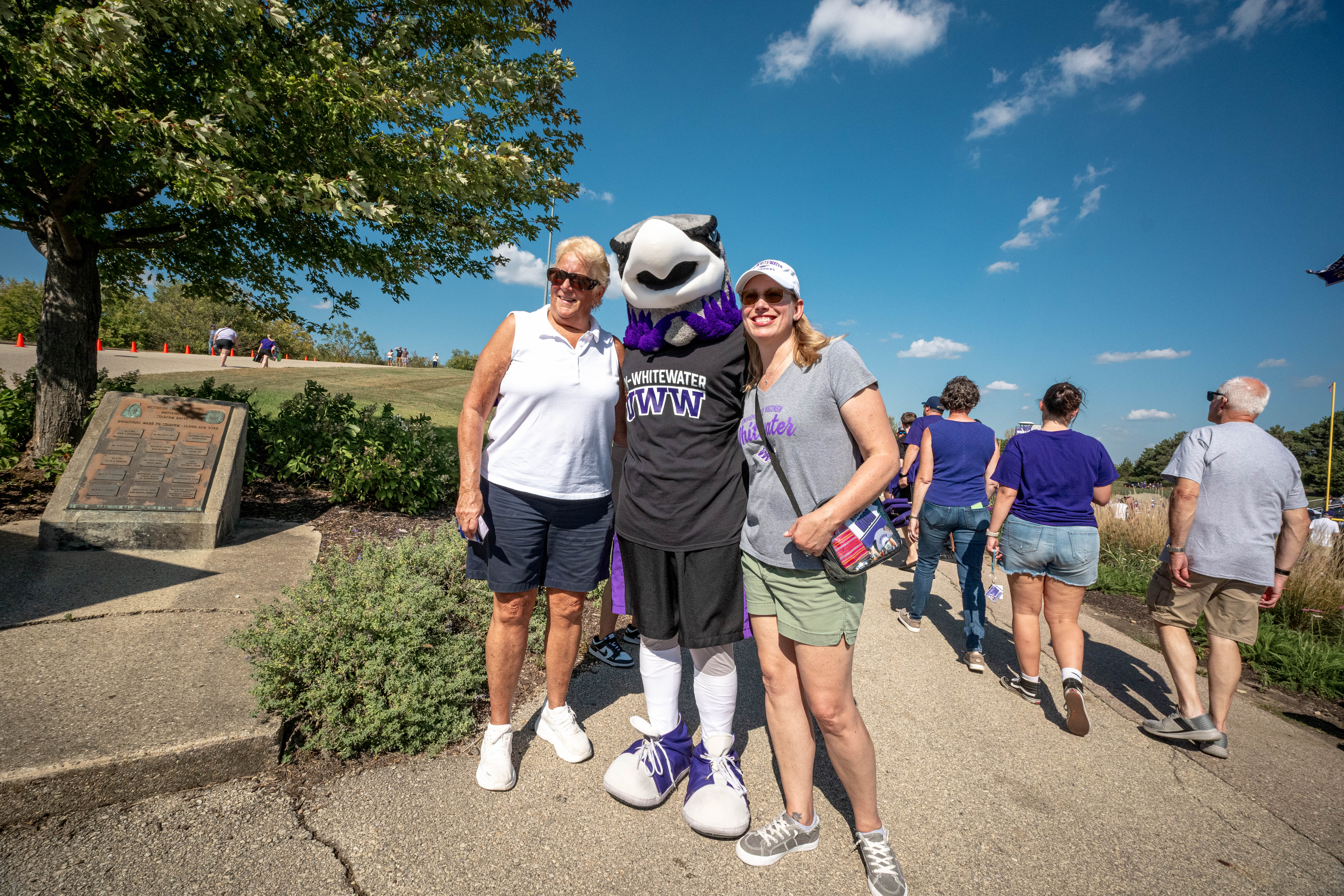 Oct 4, 2025; Whitewater, Wisconsin, USA; Willie Warhawk welcomes fans to Perkins Stadium before a college football game between the University of Wisconsin-Whitewater Warhawks and the University of Wisconsin-La Crosse Eagles on October 04, 2025 in Whitewater, Wisconsin. Photography by Ross Harried for Second Crop Sports.