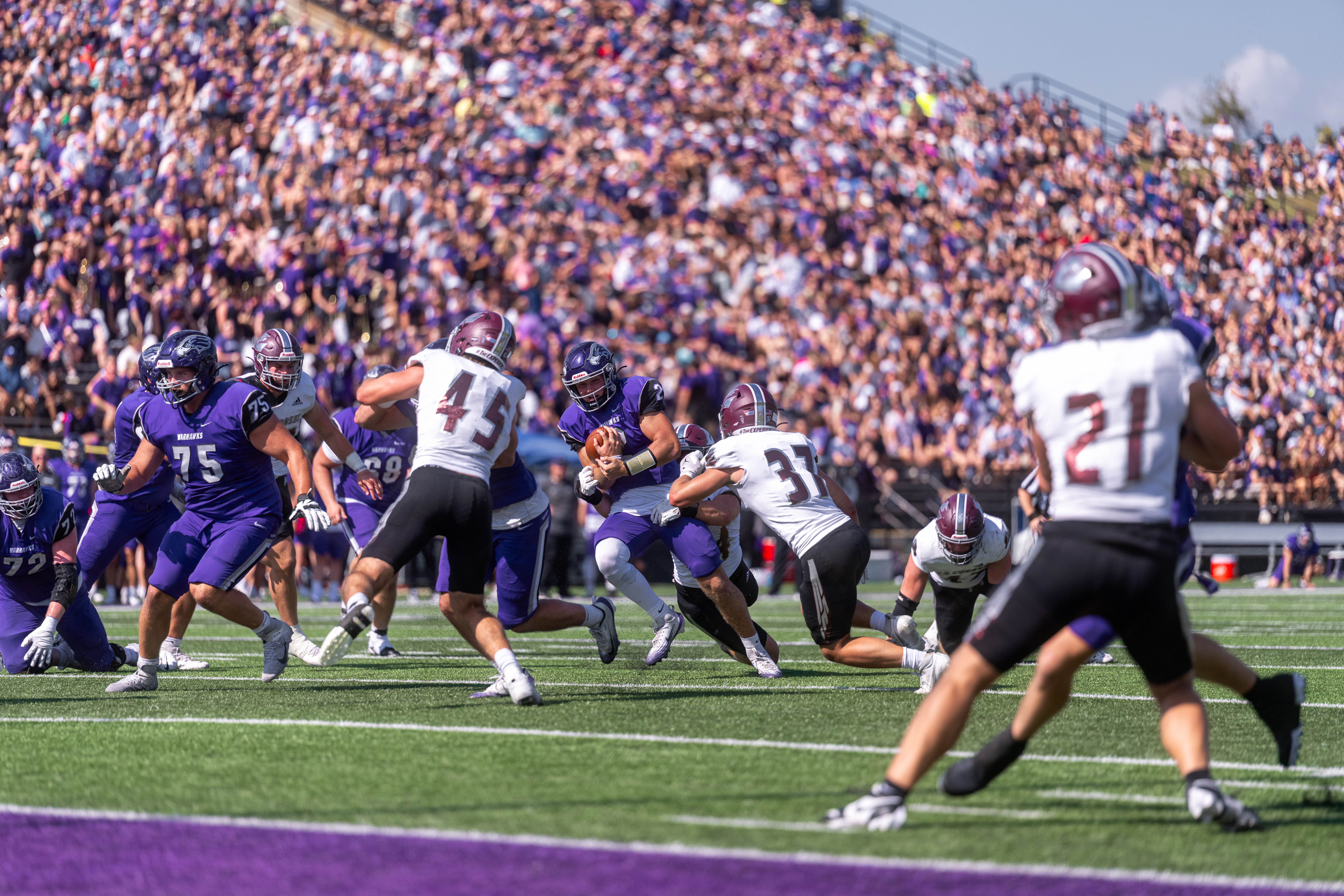 Oct 4, 2025; Whitewater, Wisconsin, USA; University of Wisconsin-Whitewater Warhawks quarterback Justin Klinkner (2) runs the ball durning a college football game between the University of Wisconsin-Whitewater Warhawks and the University of Wisconsin-La Crosse Eagles at Perkins Stadium on October 04, 2025 in Whitewater, Wisconsin. Photography by Ross Harried for Second Crop Sports.