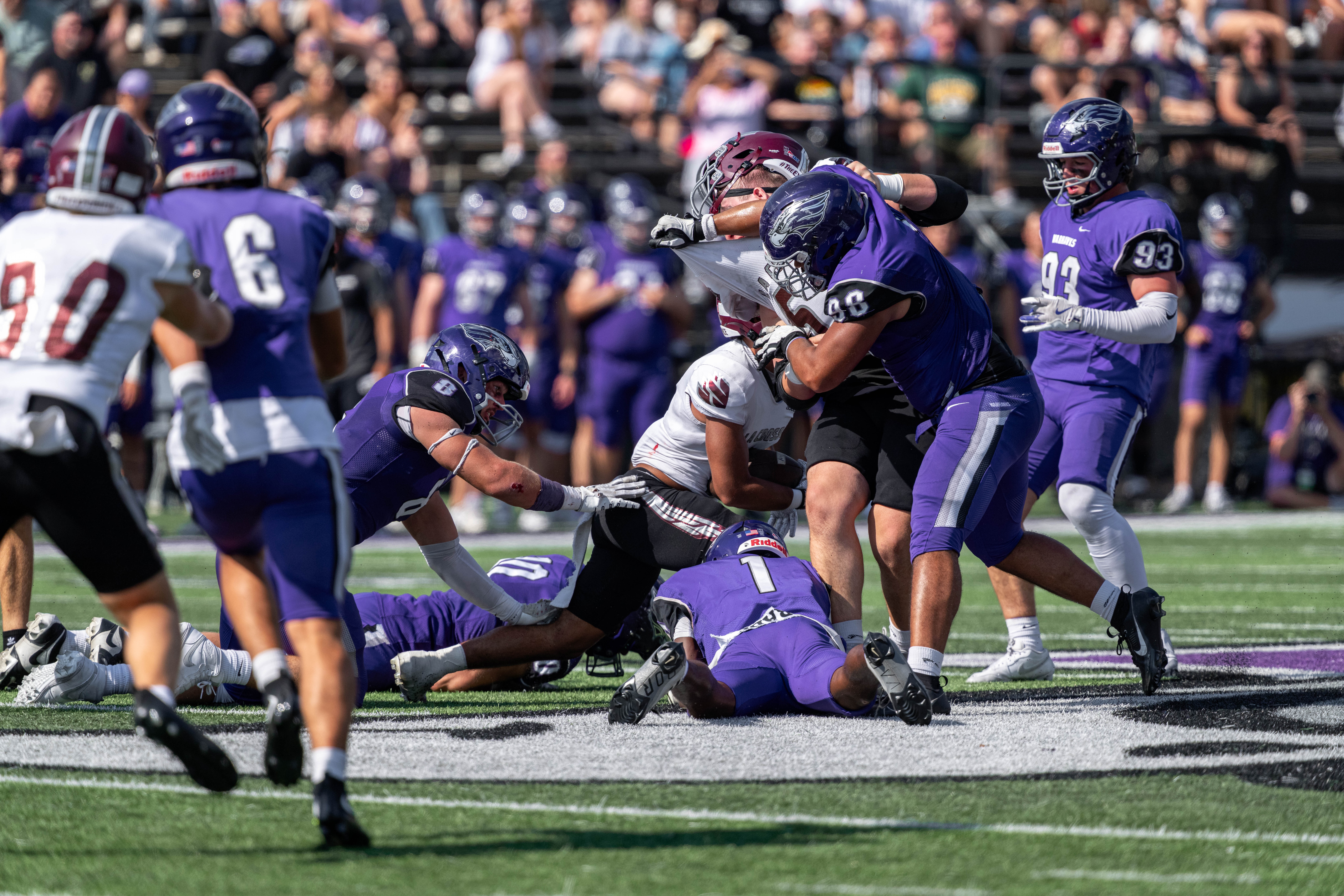 Oct 4, 2025; Whitewater, Wisconsin, USA; University of Wisconsin-Whitewater Warhawks defensive lineman Jakob Simmons (98) fights after the play durning a college football game between the University of Wisconsin-Whitewater Warhawks and the University of Wisconsin-La Crosse Eagles at Perkins Stadium on October 04, 2025 in Whitewater, Wisconsin. Photography by Ross Harried for Second Crop Sports.