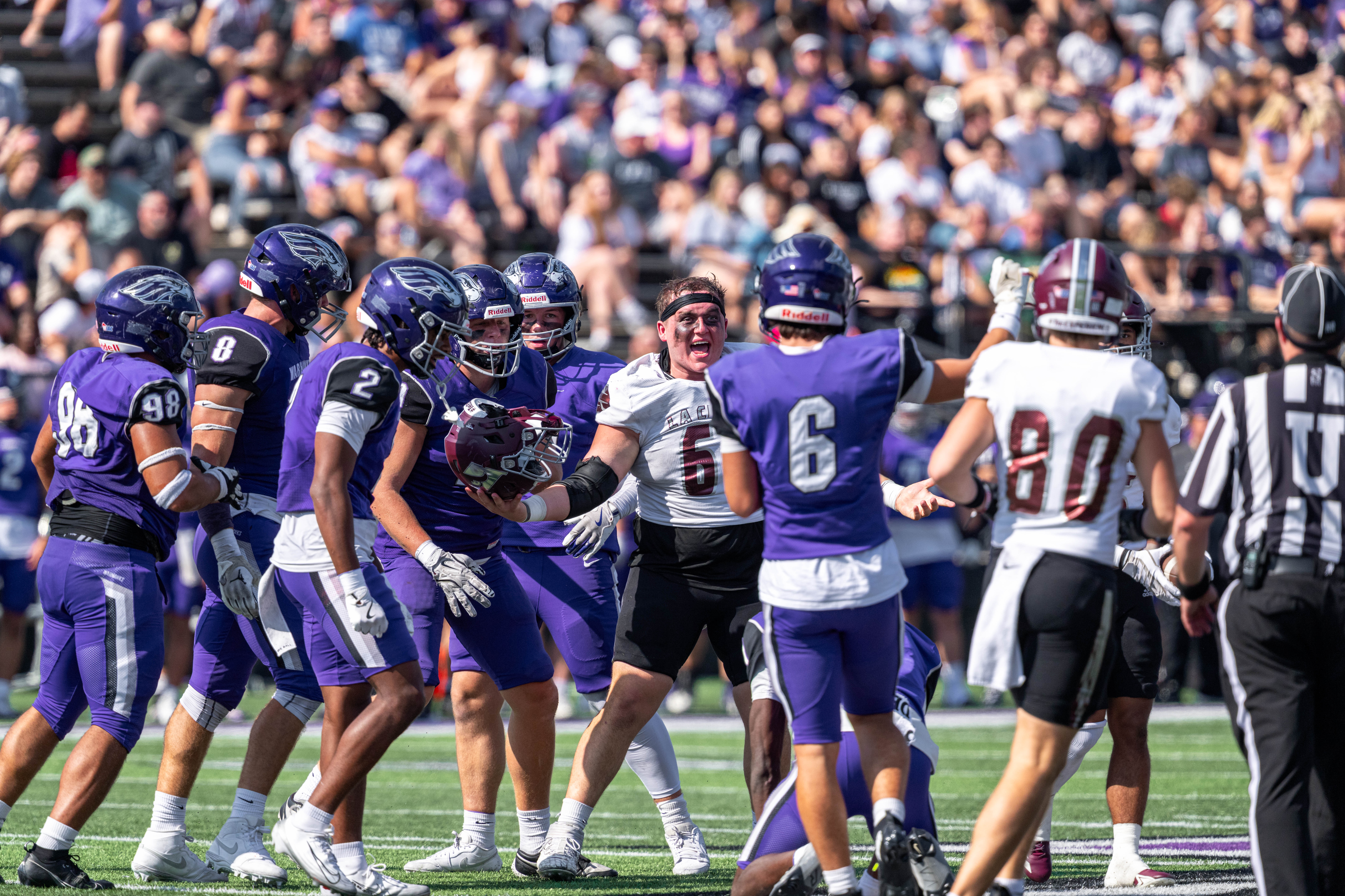 Oct 4, 2025; Whitewater, Wisconsin, USA; University of Wisconsin-La Crosse Eagles offensive lineman Watson Allan (62) has his helmet removed after a play durning a college football game between the University of Wisconsin-Whitewater Warhawks and the University of Wisconsin-La Crosse Eagles at Perkins Stadium on October 04, 2025 in Whitewater, Wisconsin. Photography by Ross Harried for Second Crop Sports.