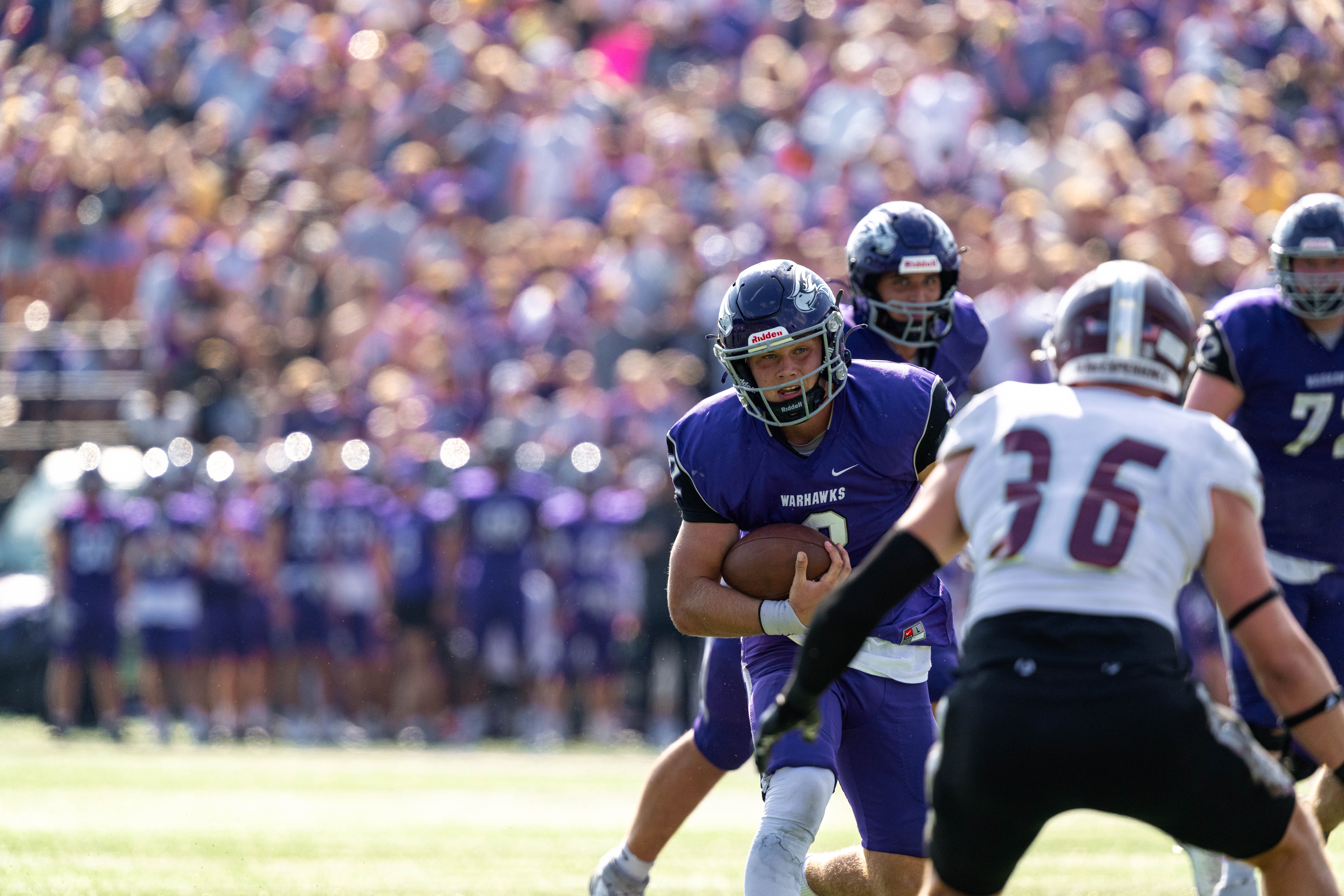 Oct 4, 2025; Whitewater, Wisconsin, USA; University of Wisconsin-Whitewater Warhawks quarterback Justin Klinkner (2) runs with the ball durning a college football game between the University of Wisconsin-Whitewater Warhawks and the University of Wisconsin-La Crosse Eagles at Perkins Stadium on October 04, 2025 in Whitewater, Wisconsin. Photography by Ross Harried for Second Crop Sports.