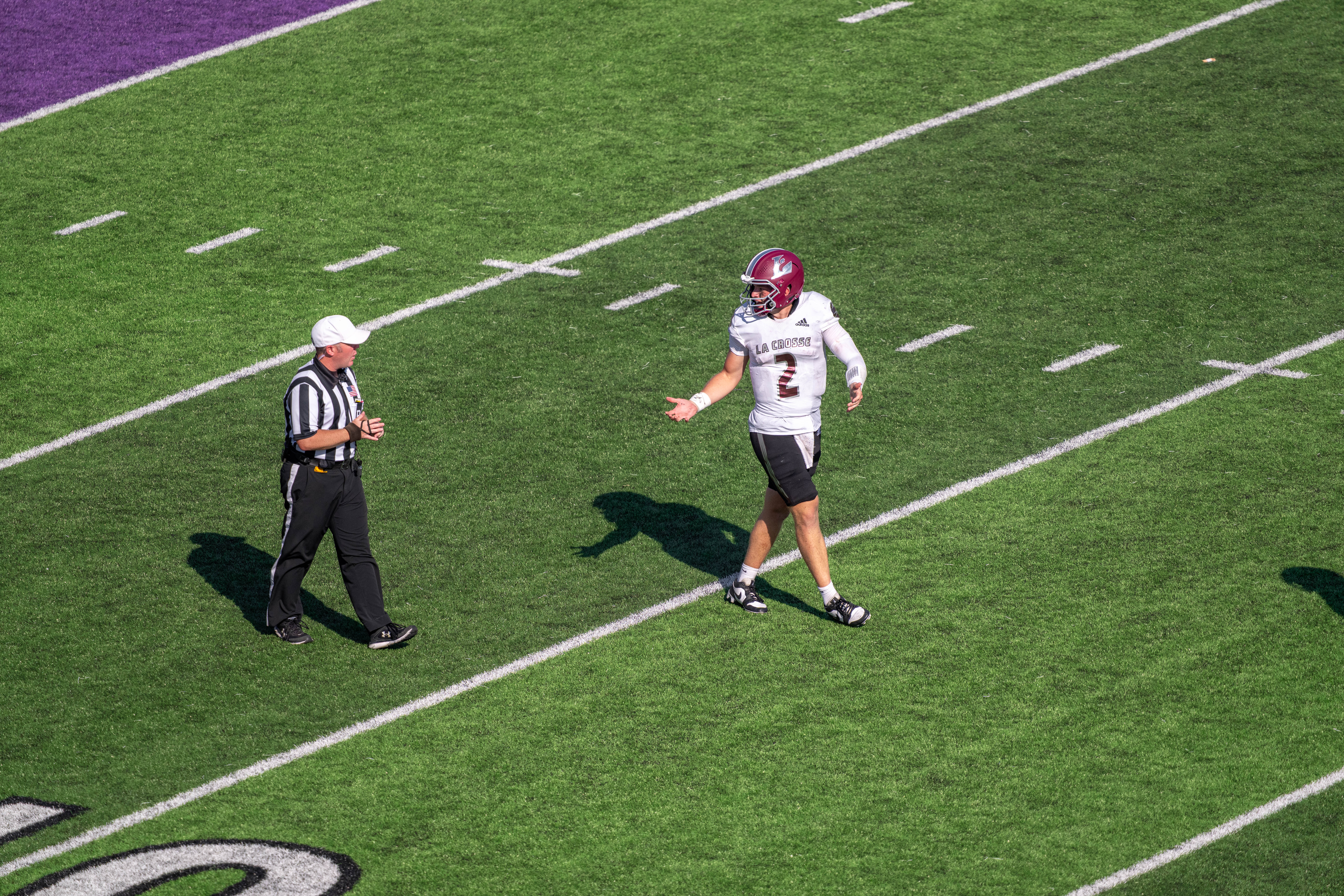 Oct 4, 2025; Whitewater, Wisconsin, USA; University of Wisconsin-La Crosse Eagles quarterback Kyle Haas (2) has words with the referee after a play durning a college football game between the University of Wisconsin-Whitewater Warhawks and the University of Wisconsin-La Crosse Eagles at Perkins Stadium on October 04, 2025 in Whitewater, Wisconsin. Photography by Ross Harried for Second Crop Sports.