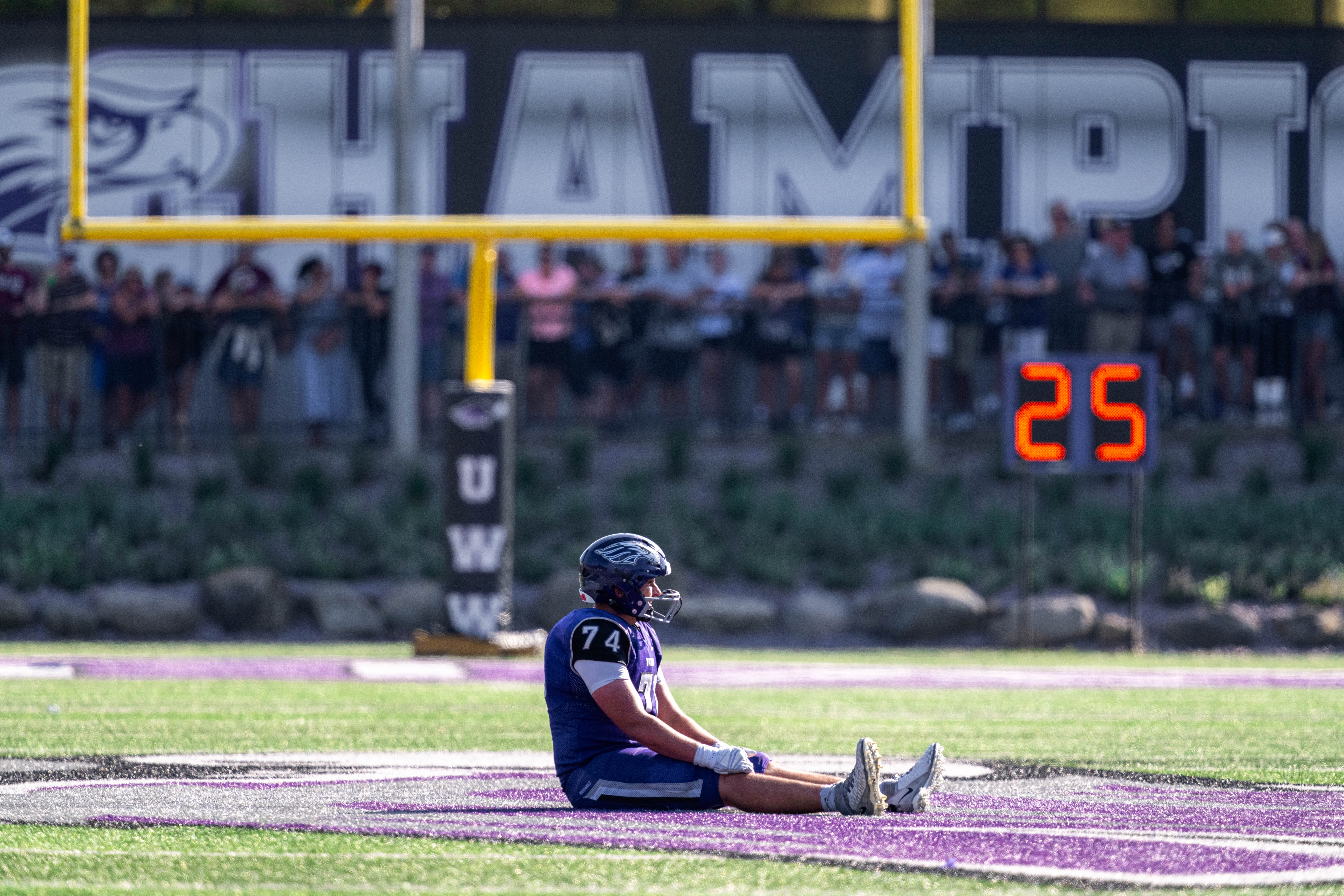 Oct 4, 2025; Whitewater, Wisconsin, USA; University of Wisconsin-Whitewater Warhawks offensive lineman Evan Oberg (74) sits down after a play durning a college football game between the University of Wisconsin-Whitewater Warhawks and the University of Wisconsin-La Crosse Eagles at Perkins Stadium on October 04, 2025 in Whitewater, Wisconsin. Photography by Ross Harried for Second Crop Sports.