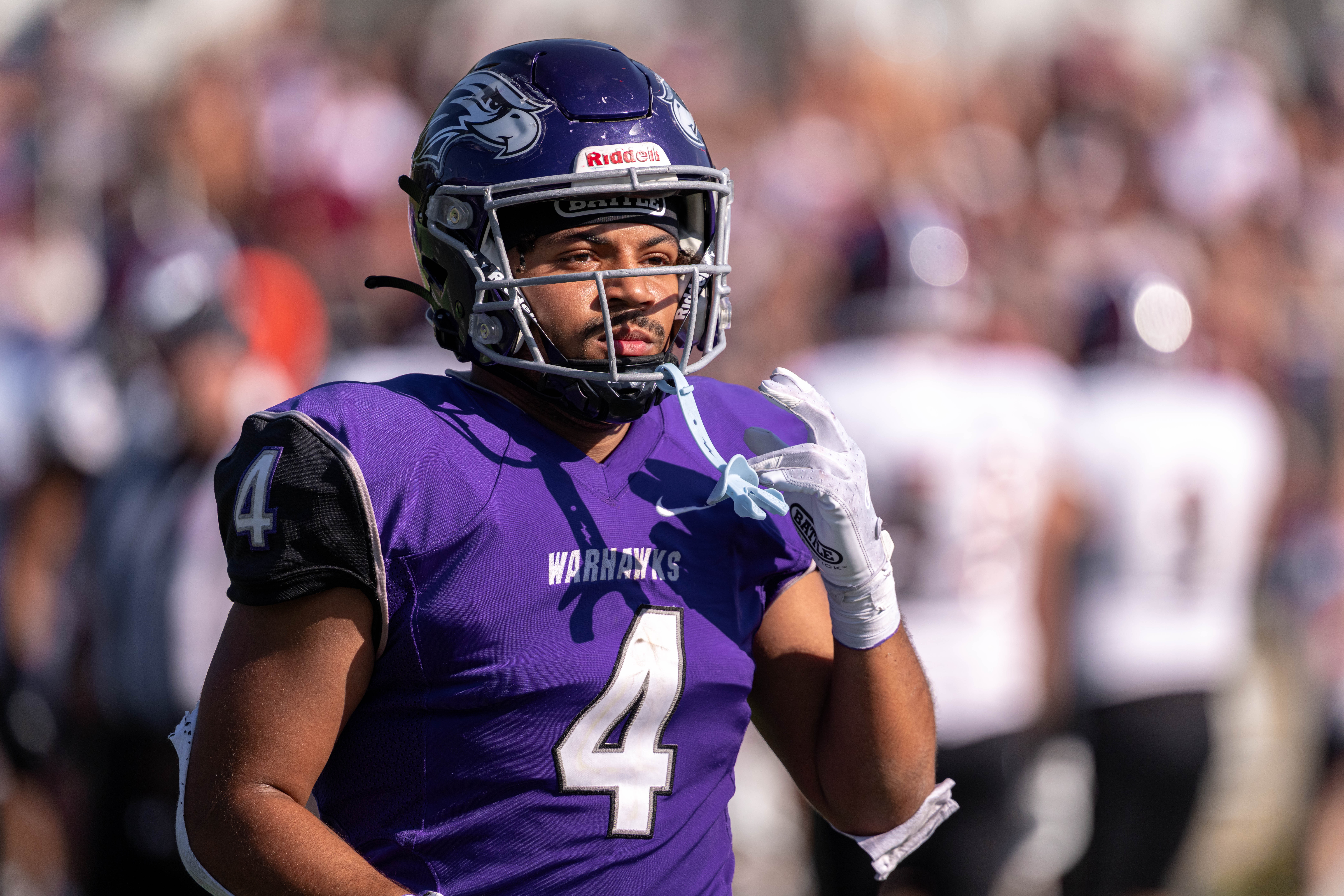 Oct 4, 2025; Whitewater, Wisconsin, USA; University of Wisconsin-Whitewater Warhawks running back Noah Battle (4) durning a college football game between the University of Wisconsin-Whitewater Warhawks and the University of Wisconsin-La Crosse Eagles at Perkins Stadium on October 04, 2025 in Whitewater, Wisconsin. Photography by Ross Harried for Second Crop Sports.