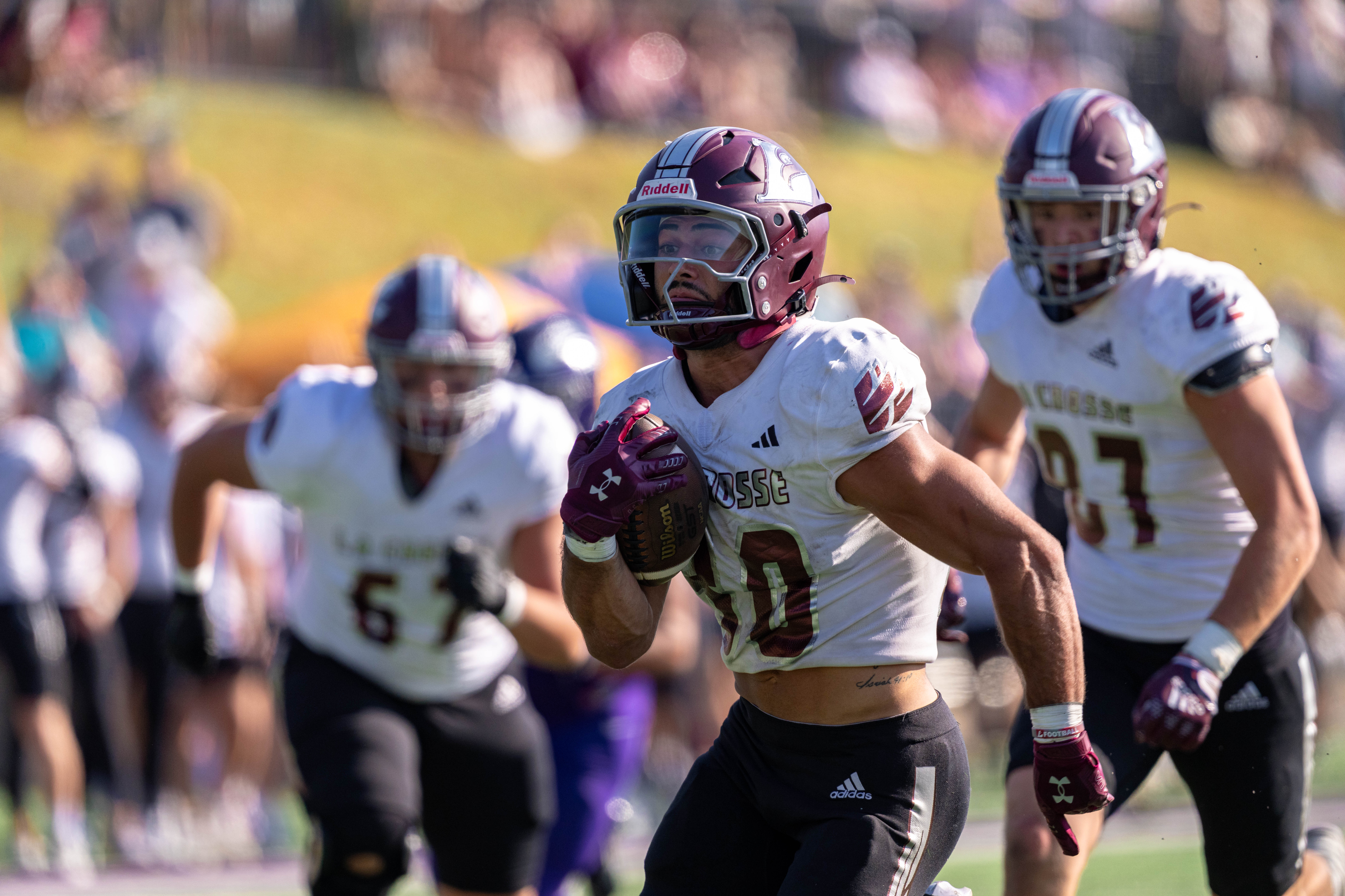 Oct 4, 2025; Whitewater, Wisconsin, USA; University of Wisconsin-La Crosse Eagles running back Gabe Lynch (30) runs the ball durning a college football game between the University of Wisconsin-Whitewater Warhawks and the University of Wisconsin-La Crosse Eagles at Perkins Stadium on October 04, 2025 in Whitewater, Wisconsin. Photography by Ross Harried for Second Crop Sports.
