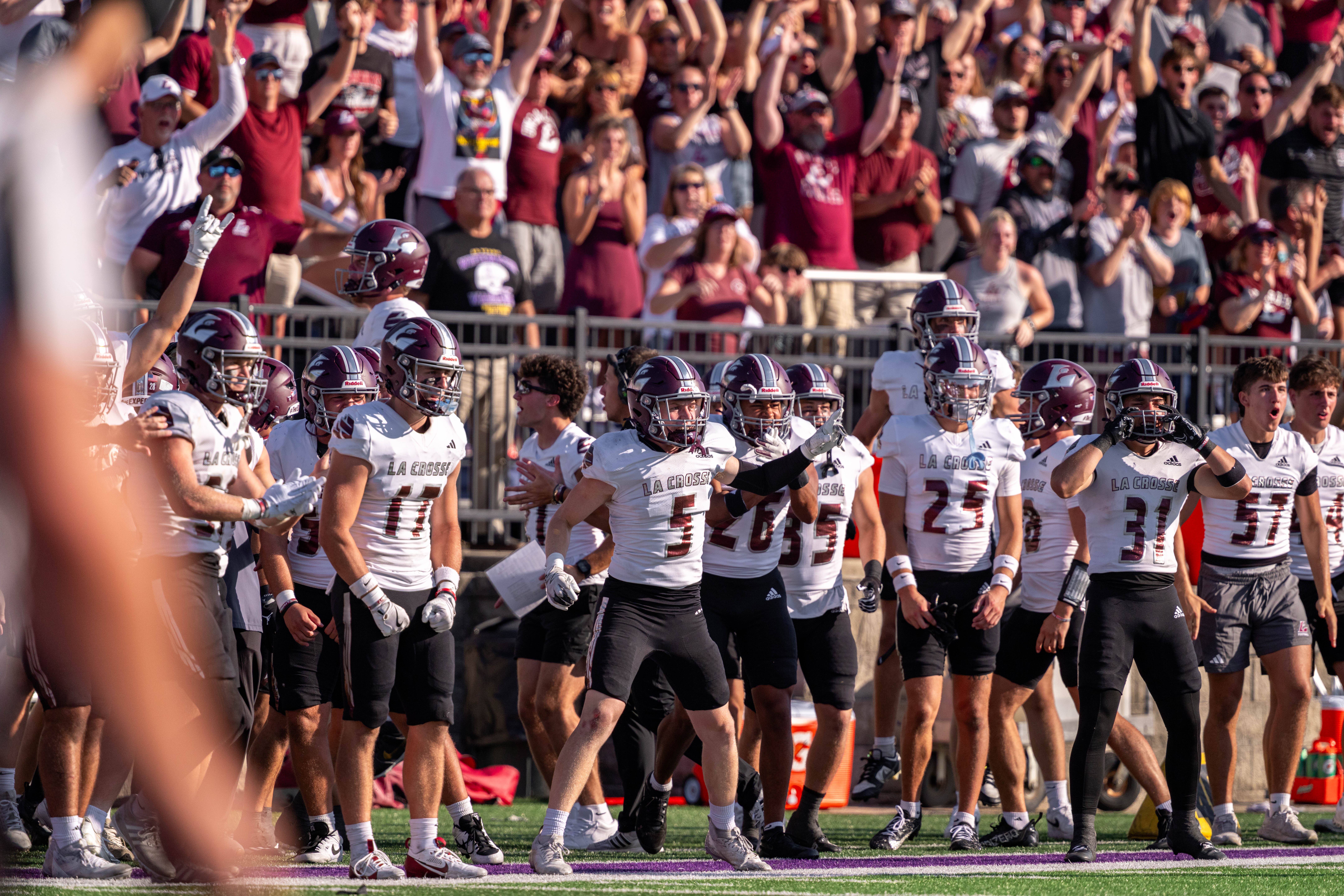 Oct 4, 2025; Whitewater, Wisconsin, USA; The University of Wisconsin-La Crosse Eagles celebrate a fumble recovery in overtime durning a college football game between the University of Wisconsin-Whitewater Warhawks and the University of Wisconsin-La Crosse Eagles at Perkins Stadium on October 04, 2025 in Whitewater, Wisconsin. Photography by Ross Harried for Second Crop Sports.