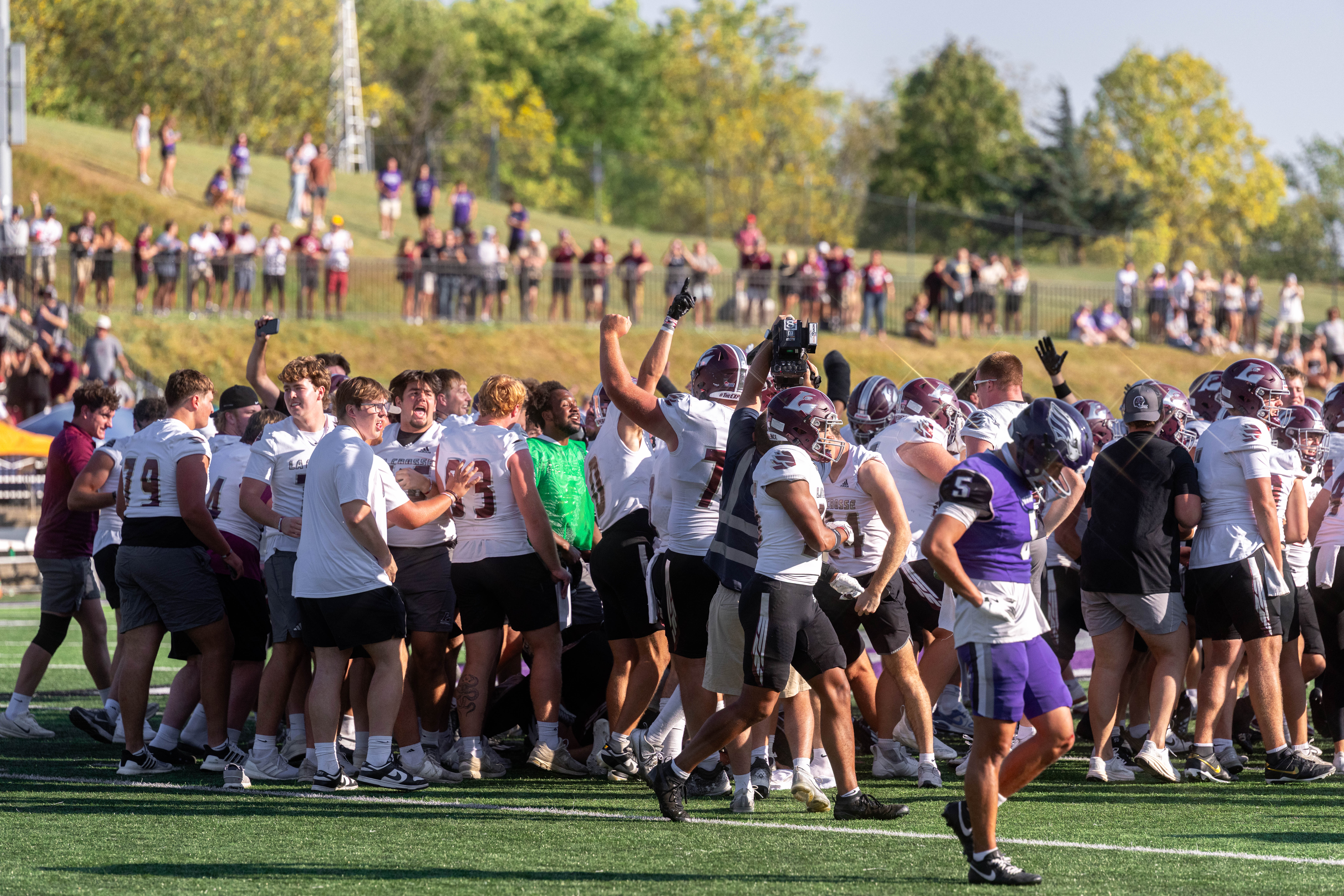 Oct 4, 2025; Whitewater, Wisconsin, USA; The University of Wisconsin-La Crosse Eagles celebrate after a college football game between the University of Wisconsin-Whitewater Warhawks and the University of Wisconsin-La Crosse Eagles at Perkins Stadium on October 04, 2025 in Whitewater, Wisconsin. Photography by Ross Harried for Second Crop Sports.