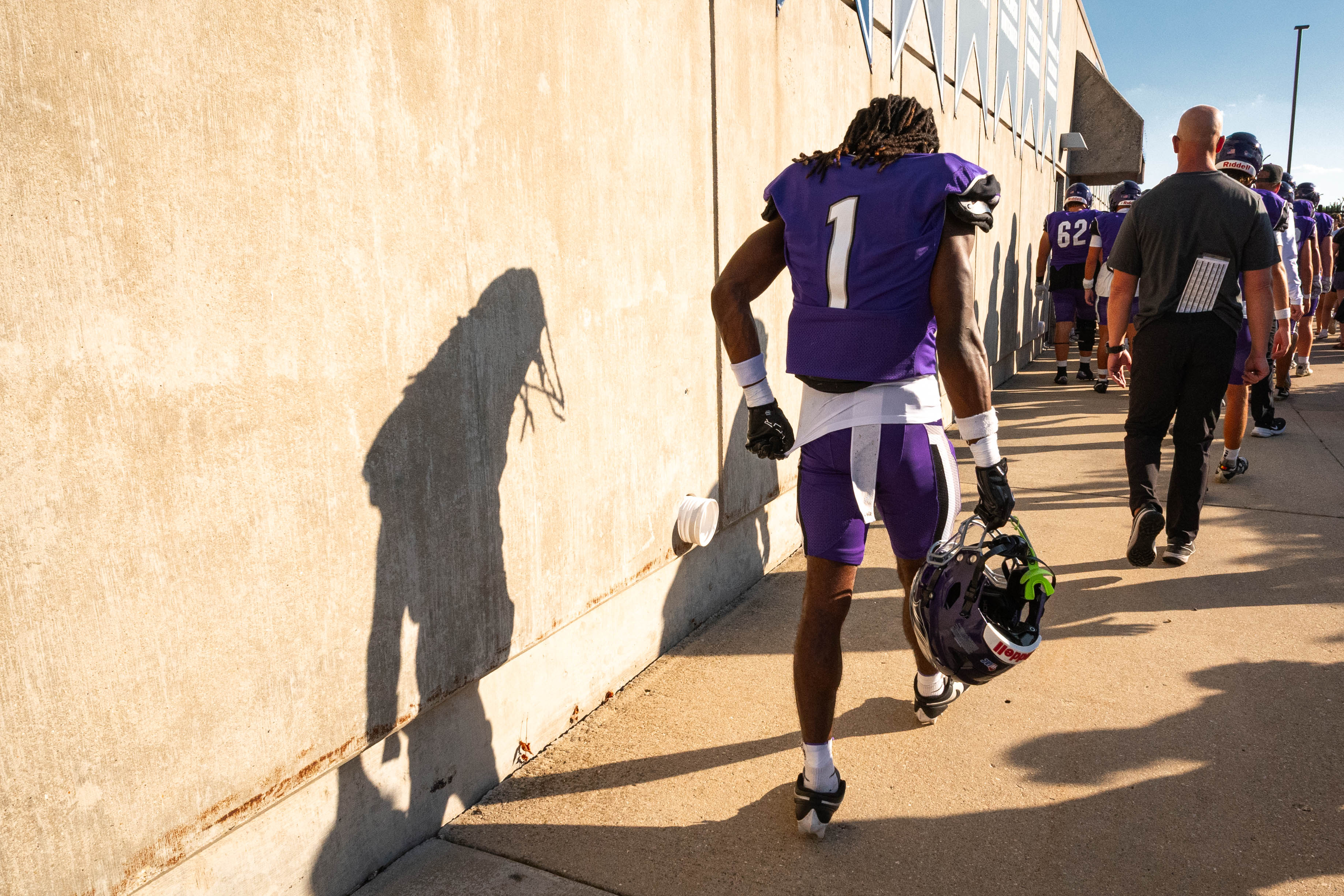 Oct 4, 2025; Whitewater, Wisconsin, USA; University of Wisconsin-Whitewater Warhawks wide receiver Christian Crump (1) returns the locker room after a college football game between the University of Wisconsin-Whitewater Warhawks and the University of Wisconsin-La Crosse Eagles at Perkins Stadium on October 04, 2025 in Whitewater, Wisconsin. Photography by Ross Harried for Second Crop Sports.